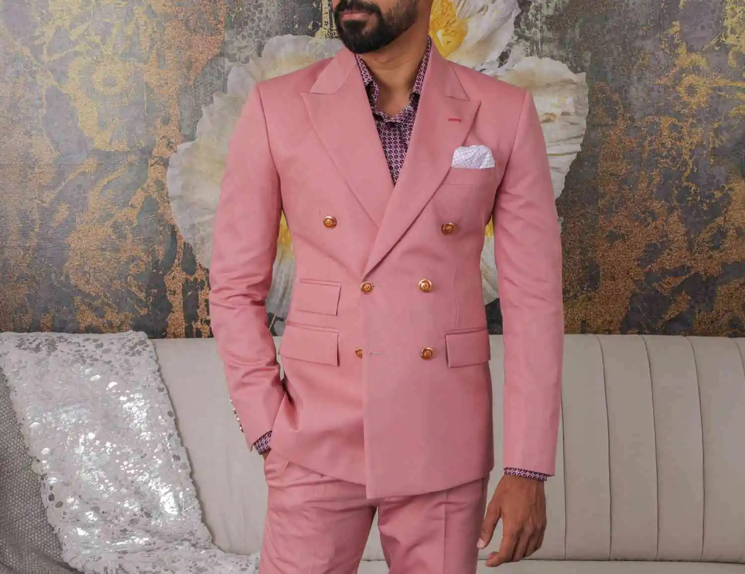 A man styling in pink custom suit 
