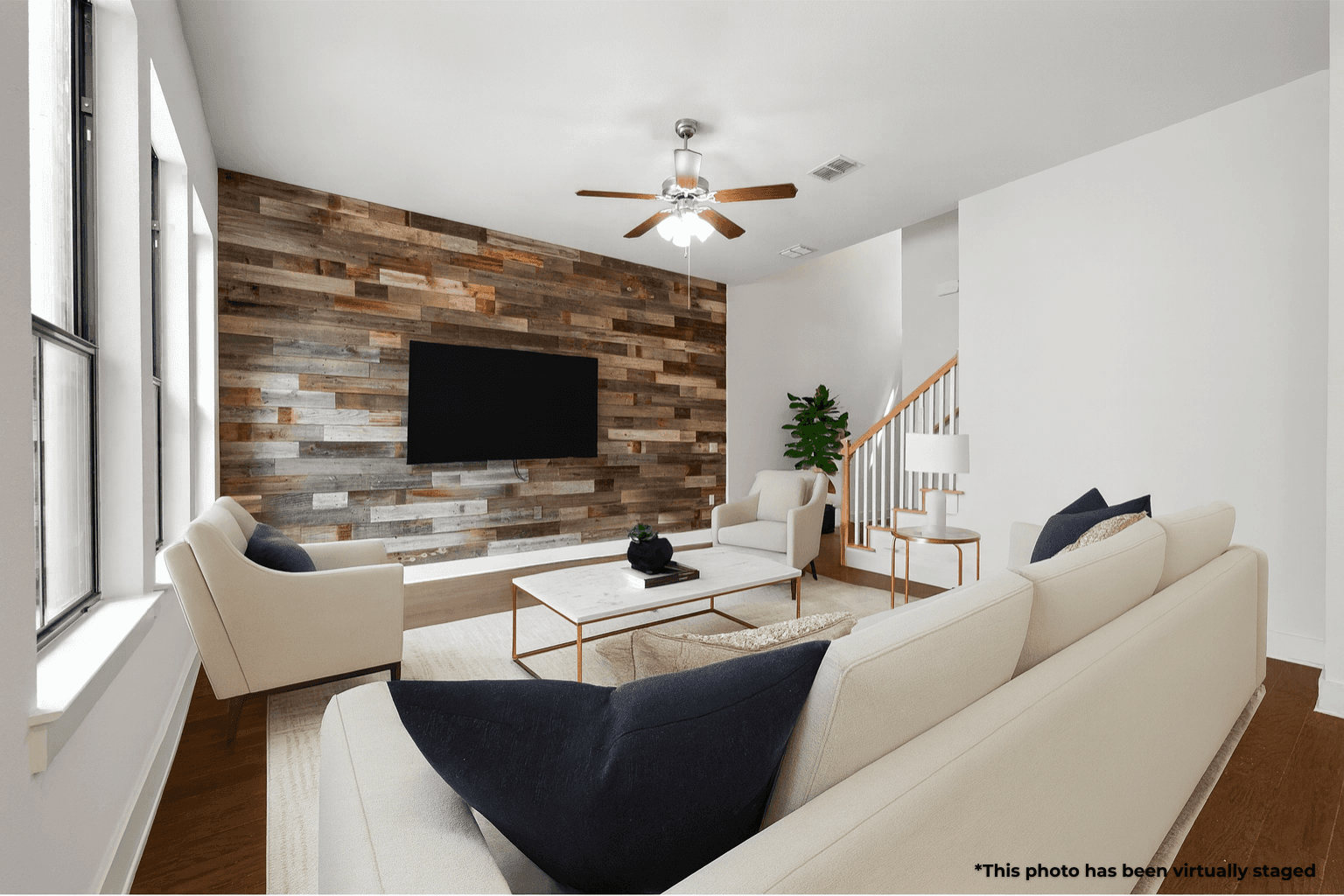 Virtually staged photo of the living room at 3904 Teaff St.