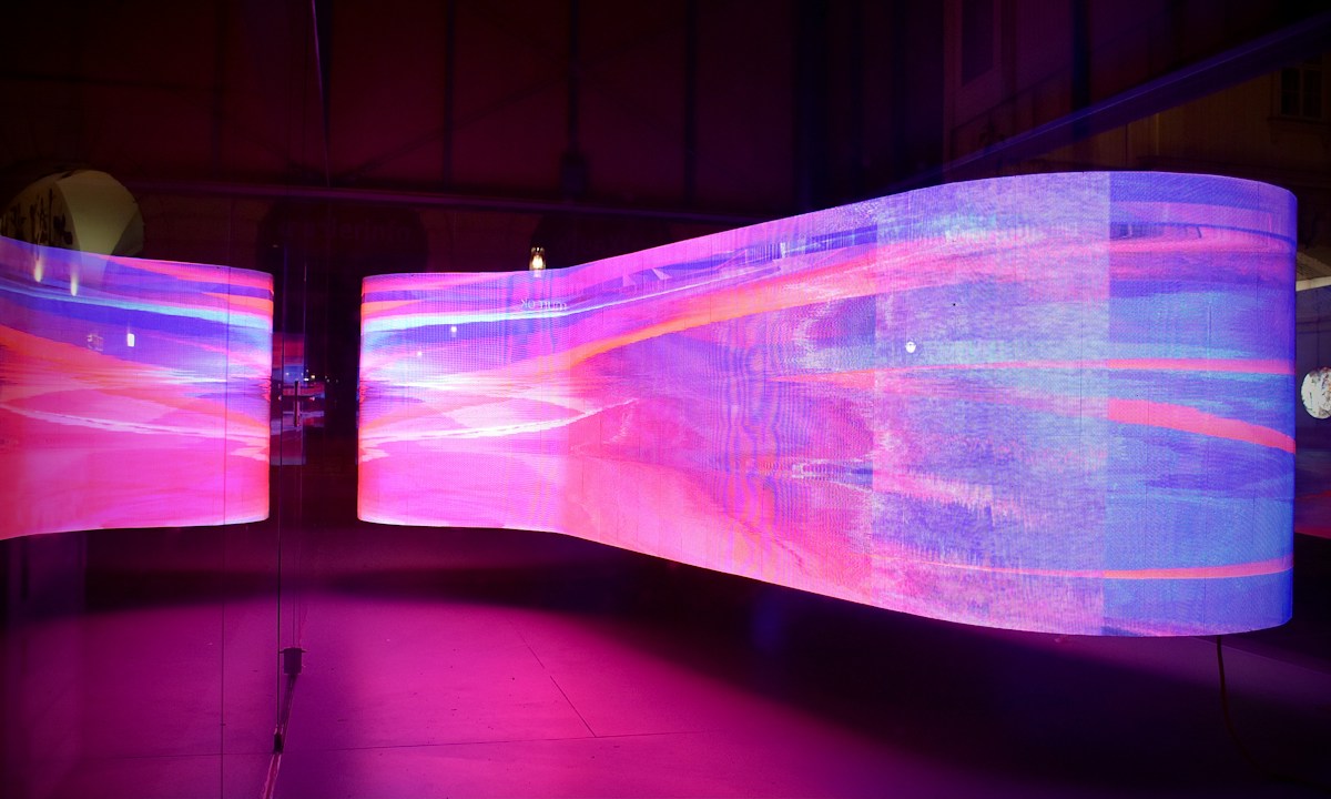 Curved LED screens with colourful visuals