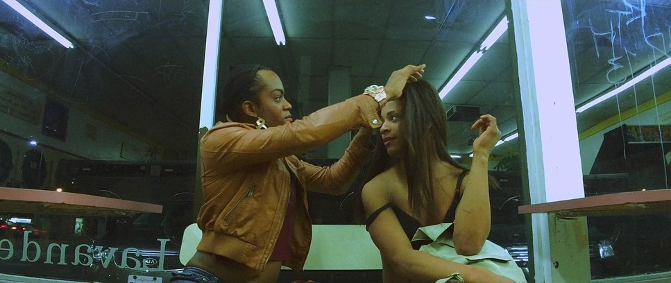 Riding a bicycle with V sign