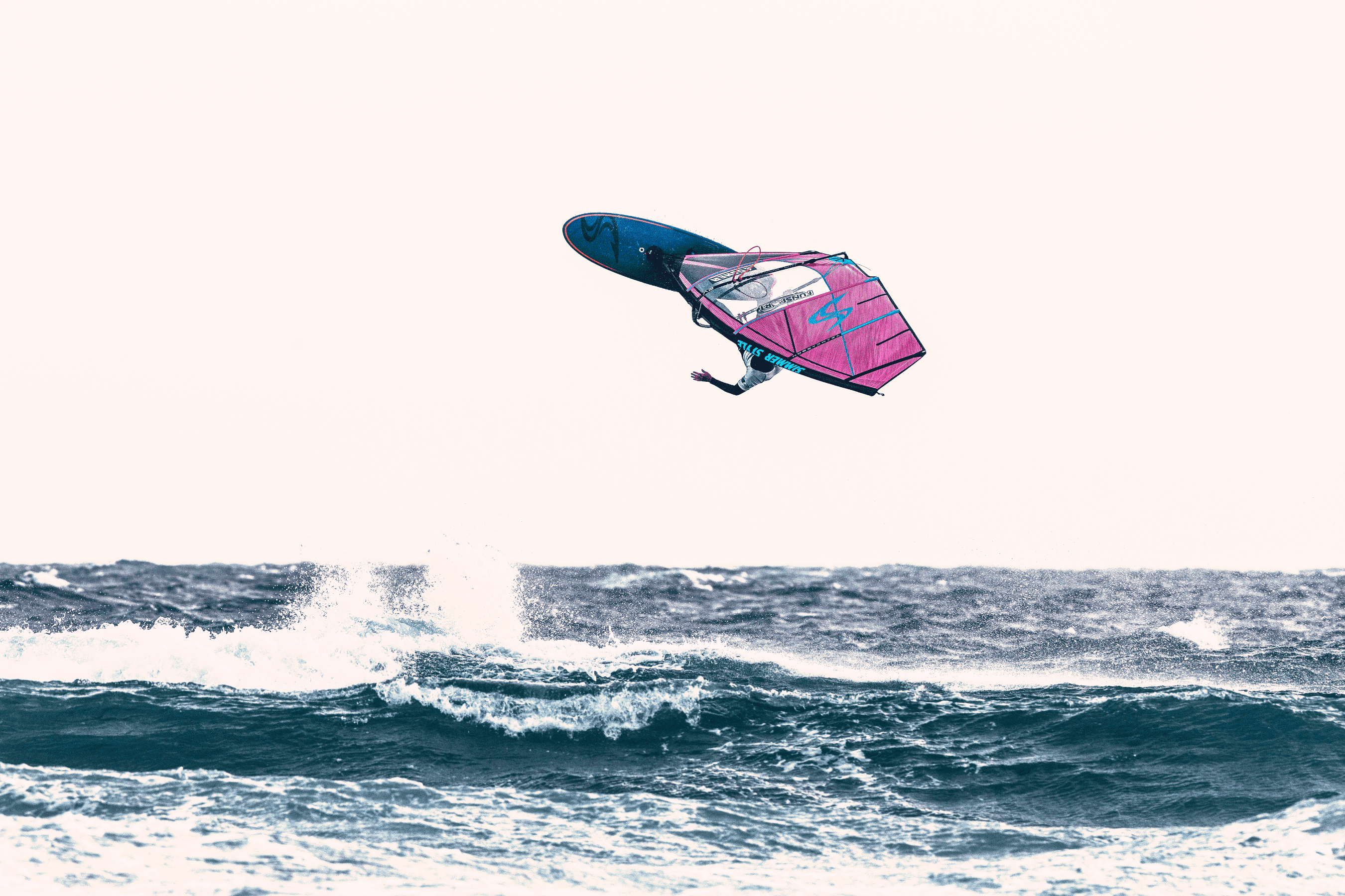 Man is Windsurfing