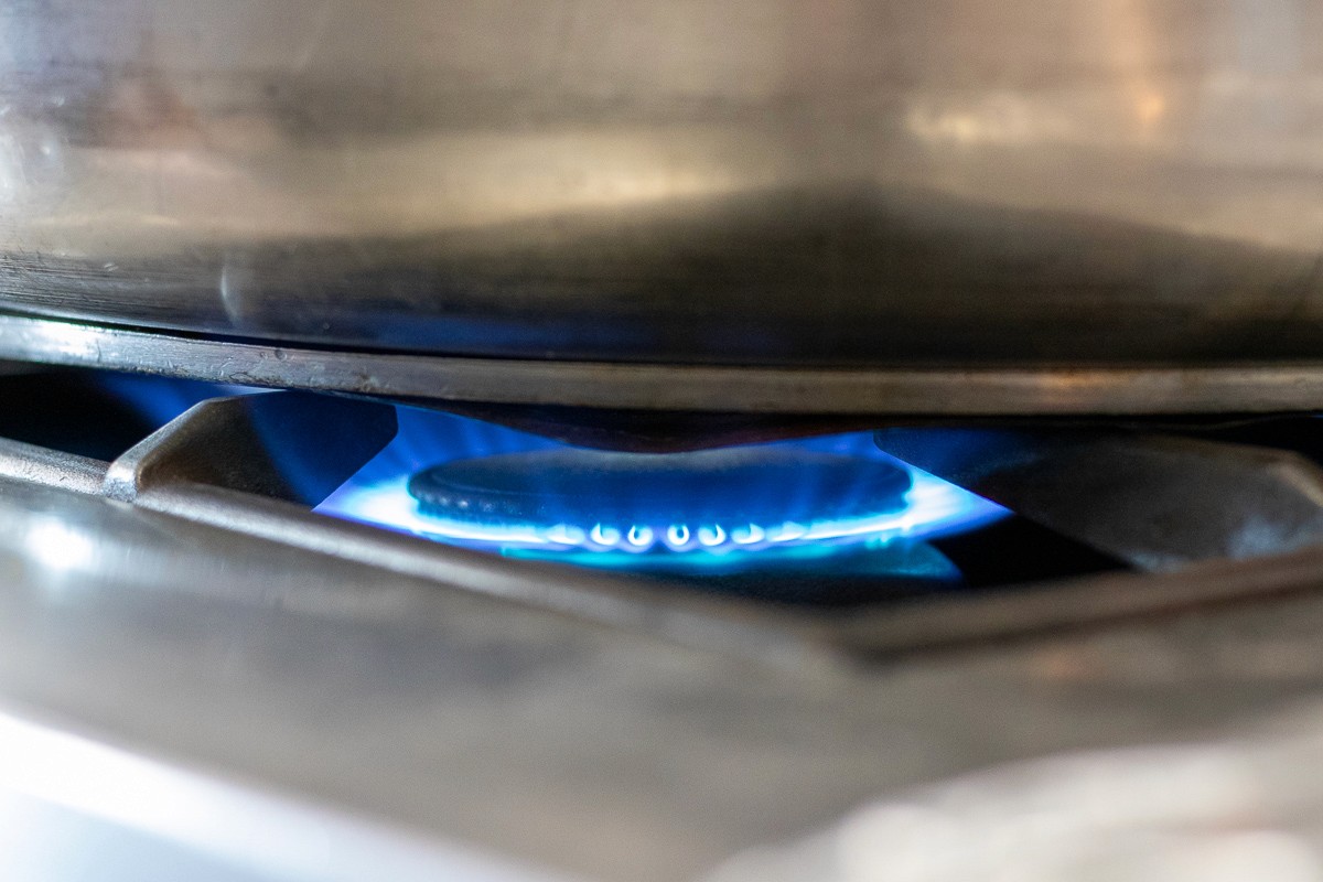 tilt-shift photography of person in brown jacket