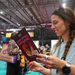 Dr. Mariam learning from a booklet they gave her at BVA Live