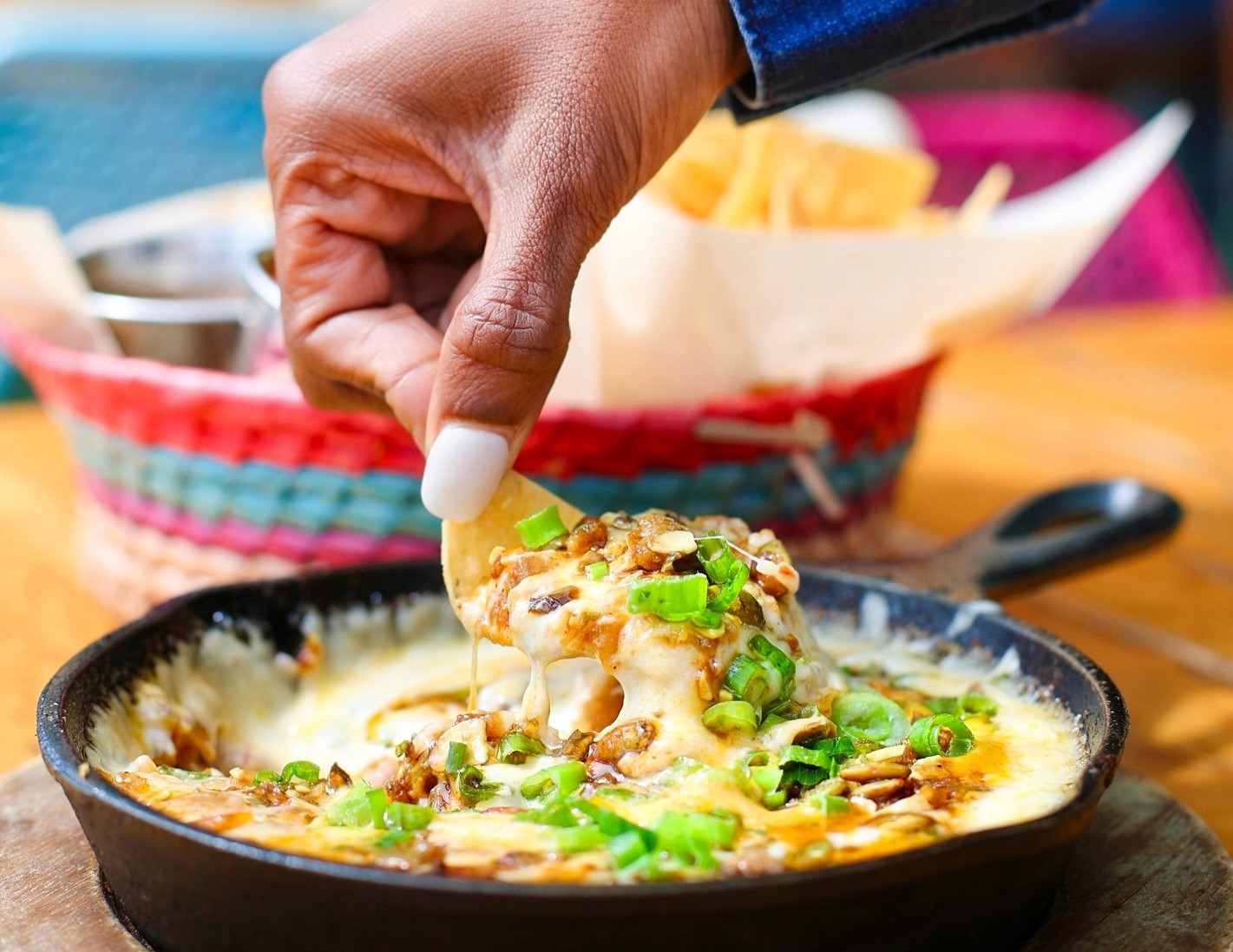 Close-up of a creamy dip served at Blue Plate Taco, paired with crunchy tortilla chips for the perfect appetizer in Santa Monica’s oceanfront setting.