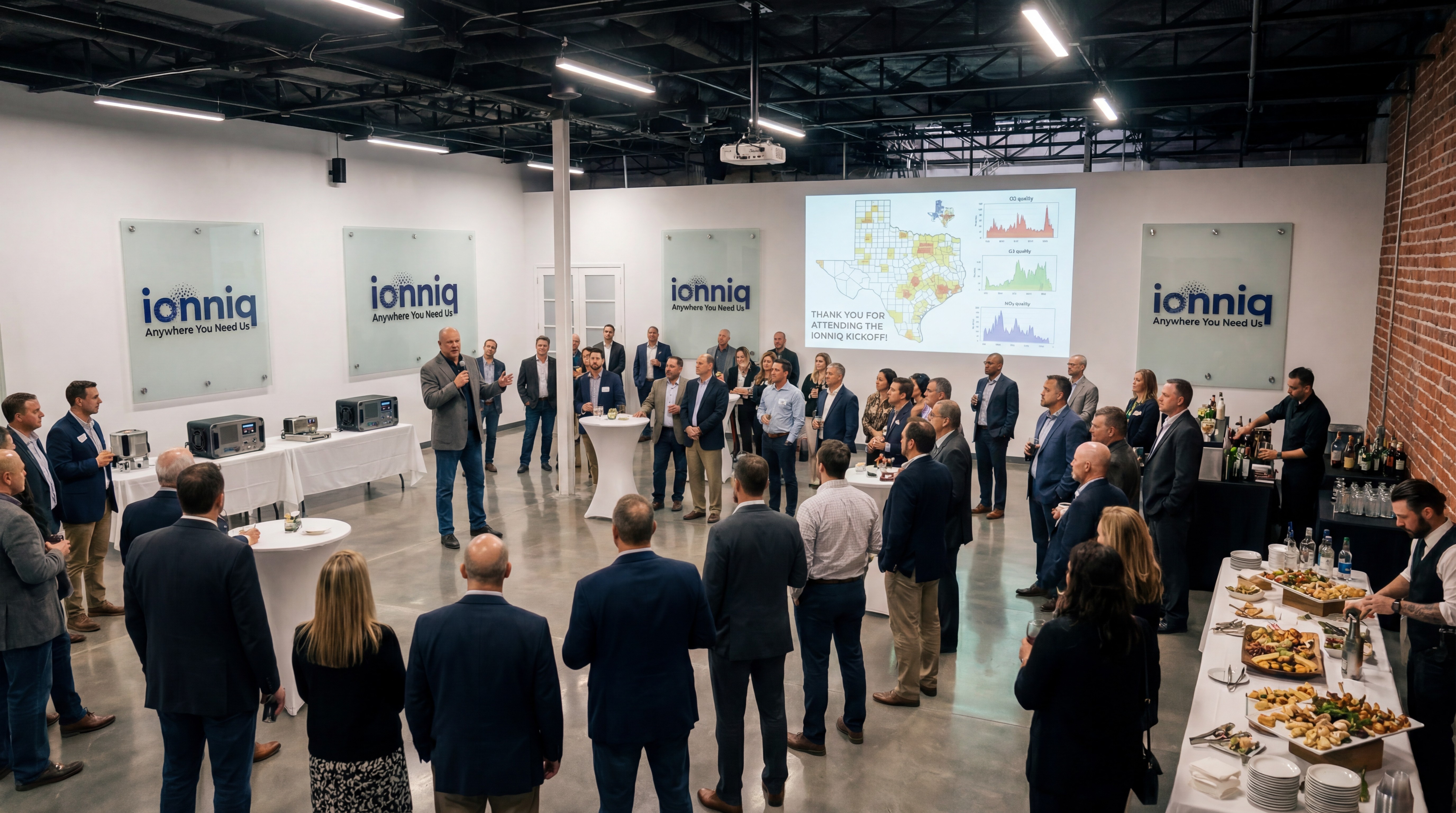 Three people in conversation with warm lighting, including a person wearing a hat and another person wrapped in what appears to be a textured shawl or sweater.
