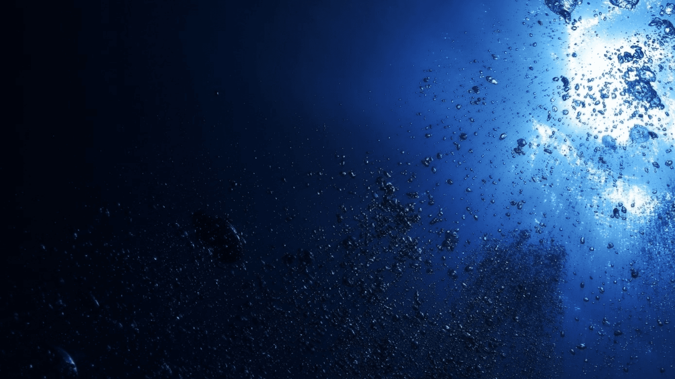 A futuristic ship glowing in blue light, sailing on a dark, reflective surface.