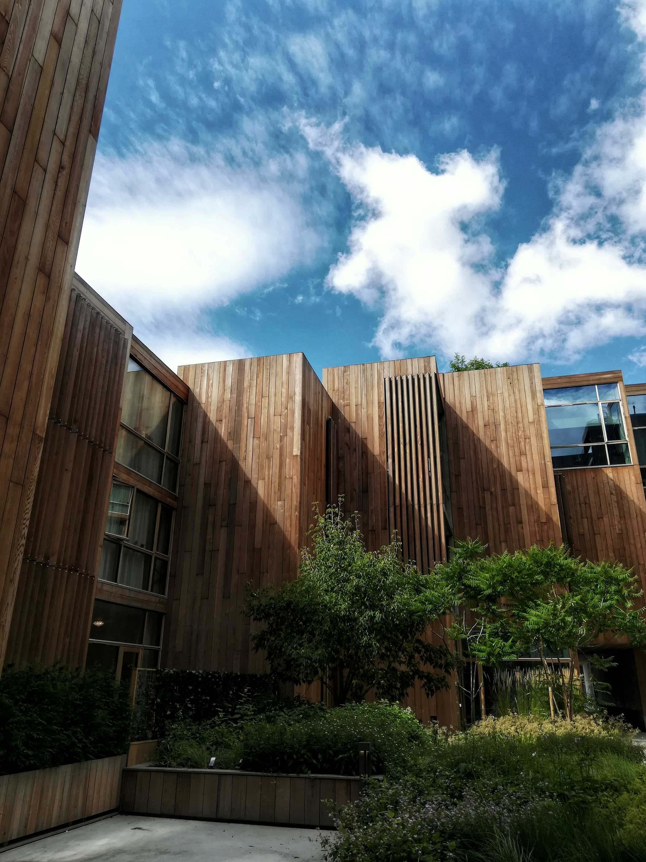 Wooden clad office building on a bright sunny day