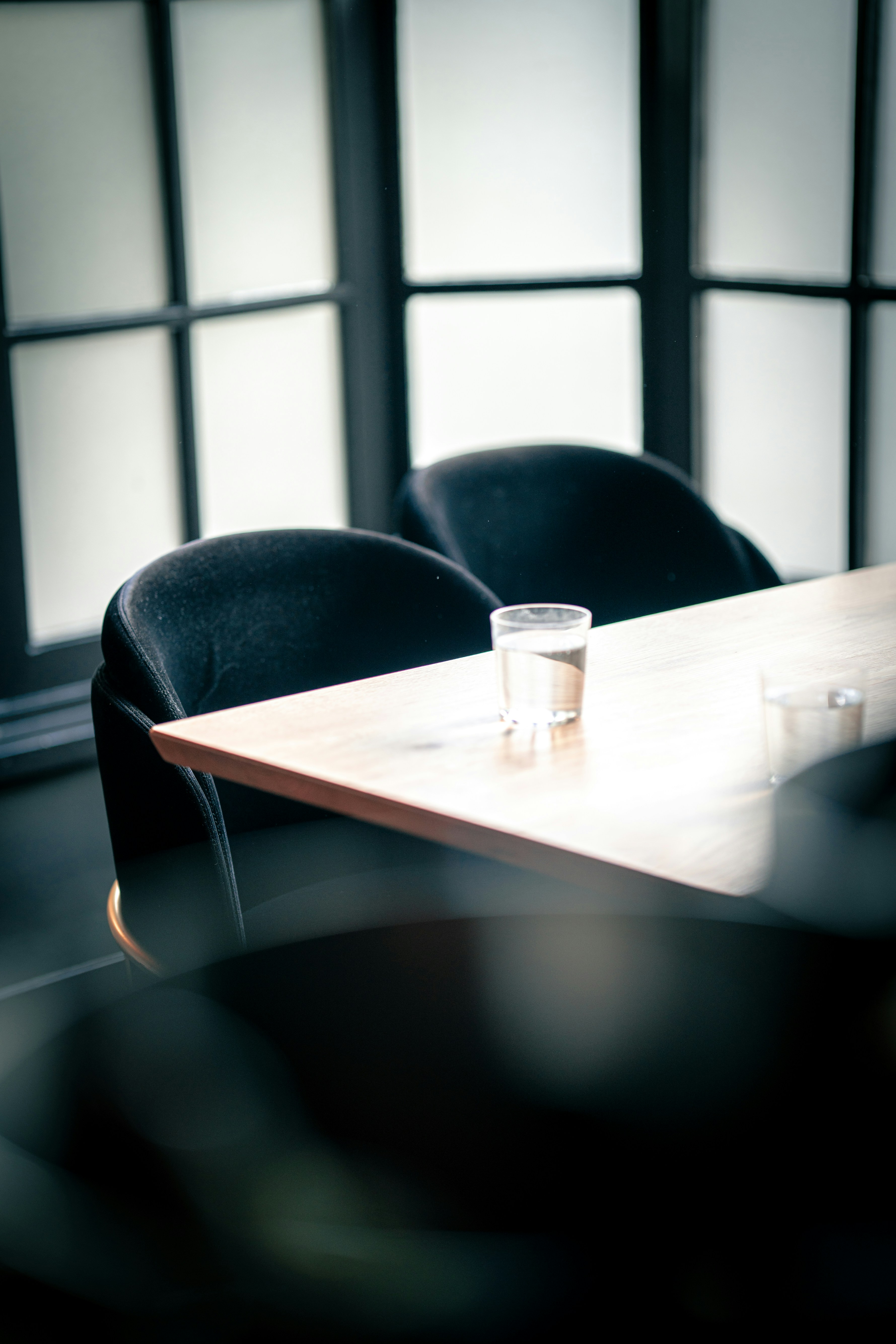 person writing on a piece of paper 