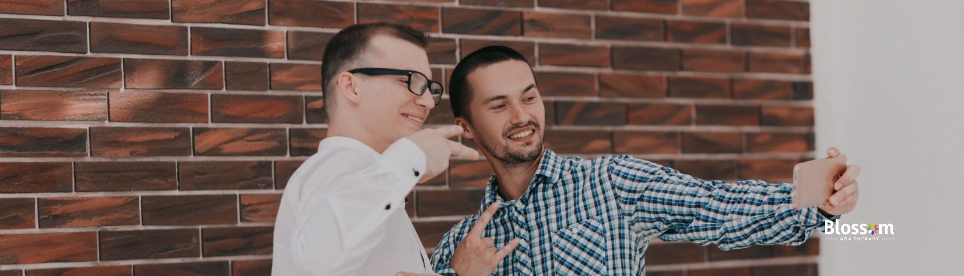 Two men taking a selfie.