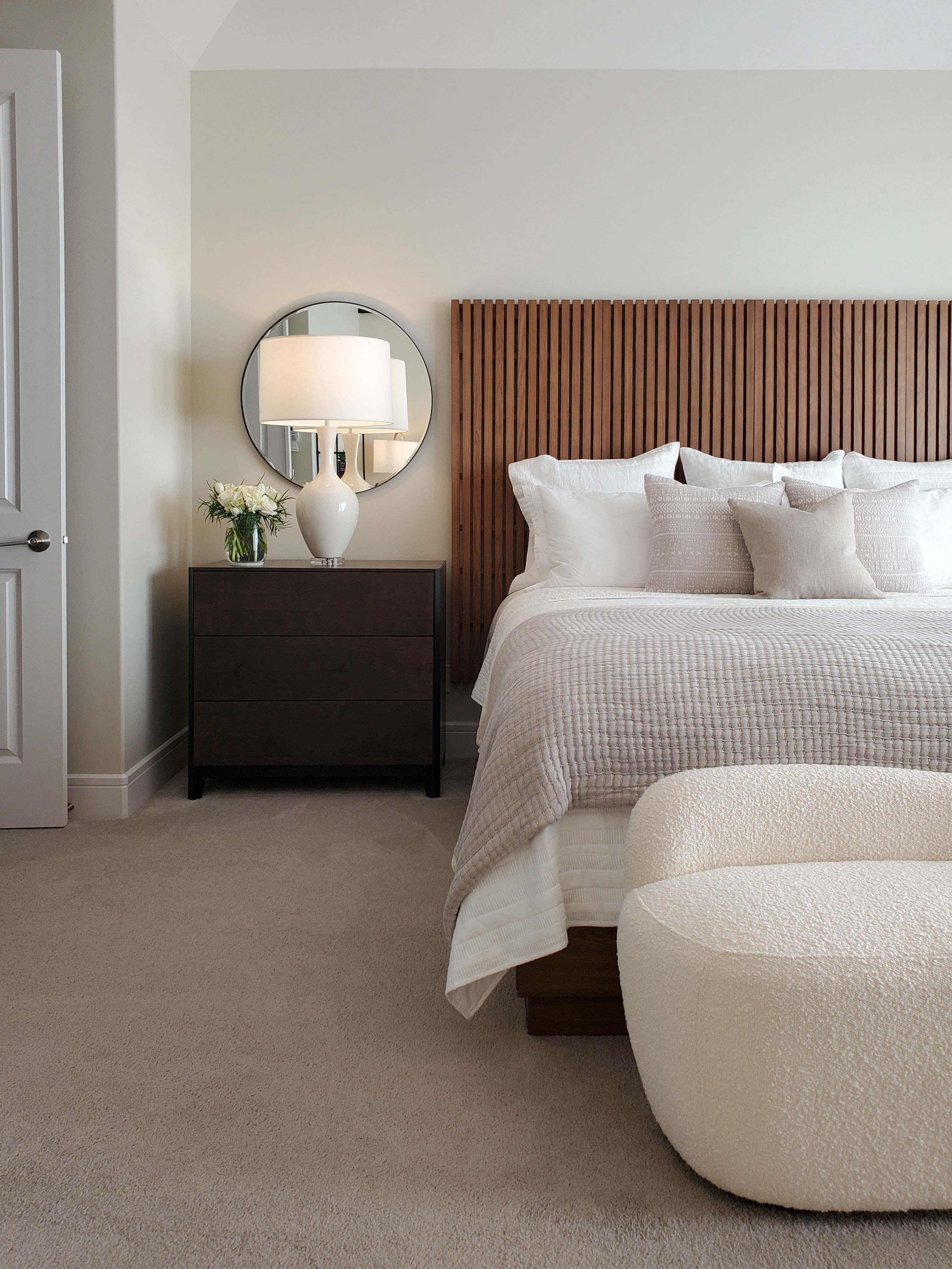 Image of KHD Homes primary ensuite bedroom with modern furniture and layout design for home renovations.
