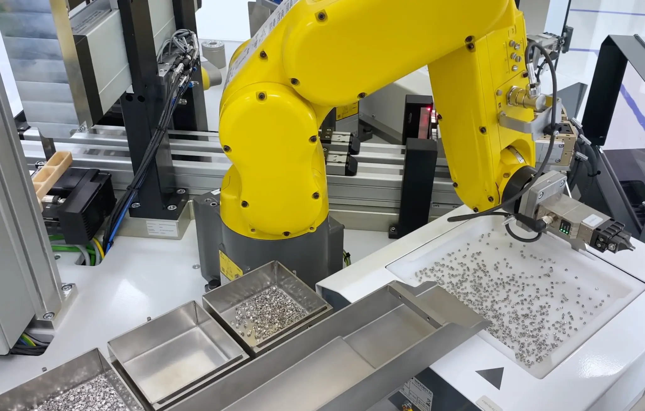 Robot is switching tools for new product