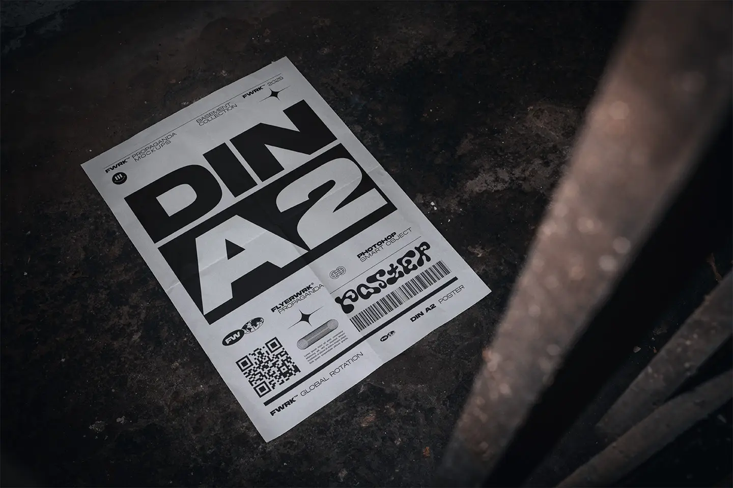 Basement A2 Poster Mockup showing a white paper design laid on a dusty concrete floor