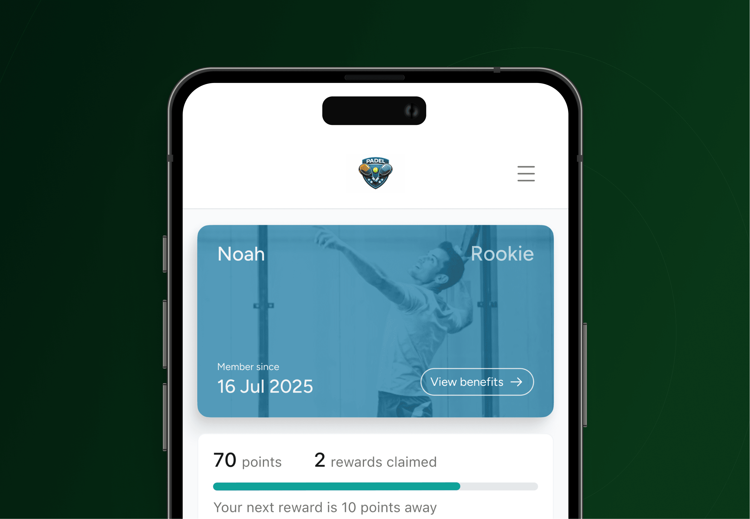 A price tag on a desk with a laptop and tablet