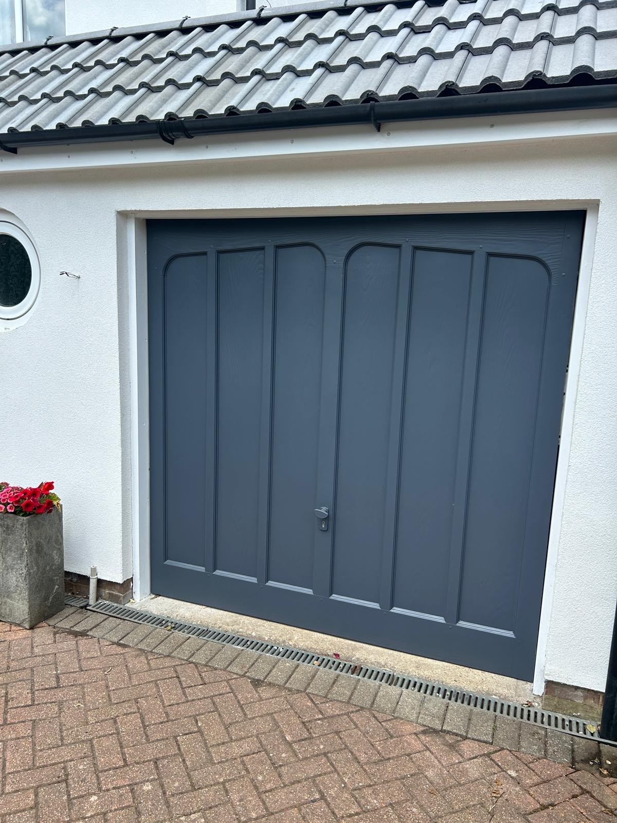 man standing in front of open doorway