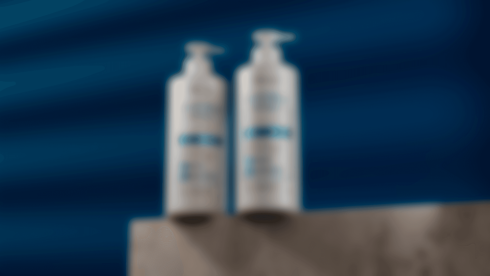 Futuristic sneaker with silver and green details, slightly blurred on an orange background