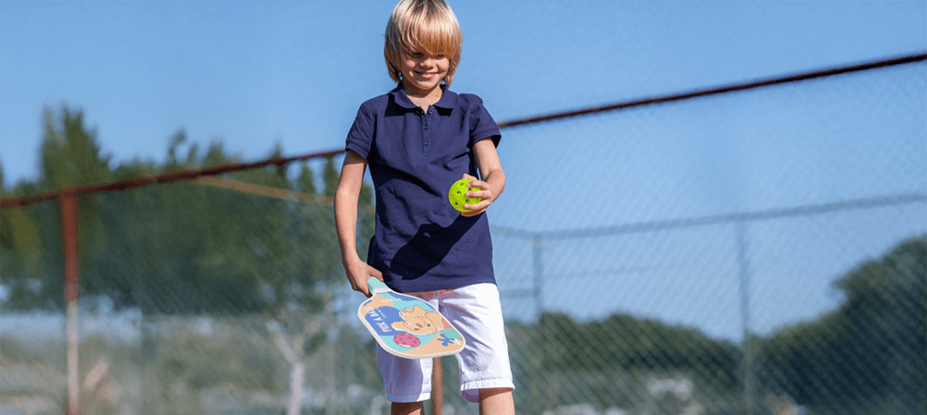 Students developing coordination and teamwork in a HOKALI youth pickleball enrichment class