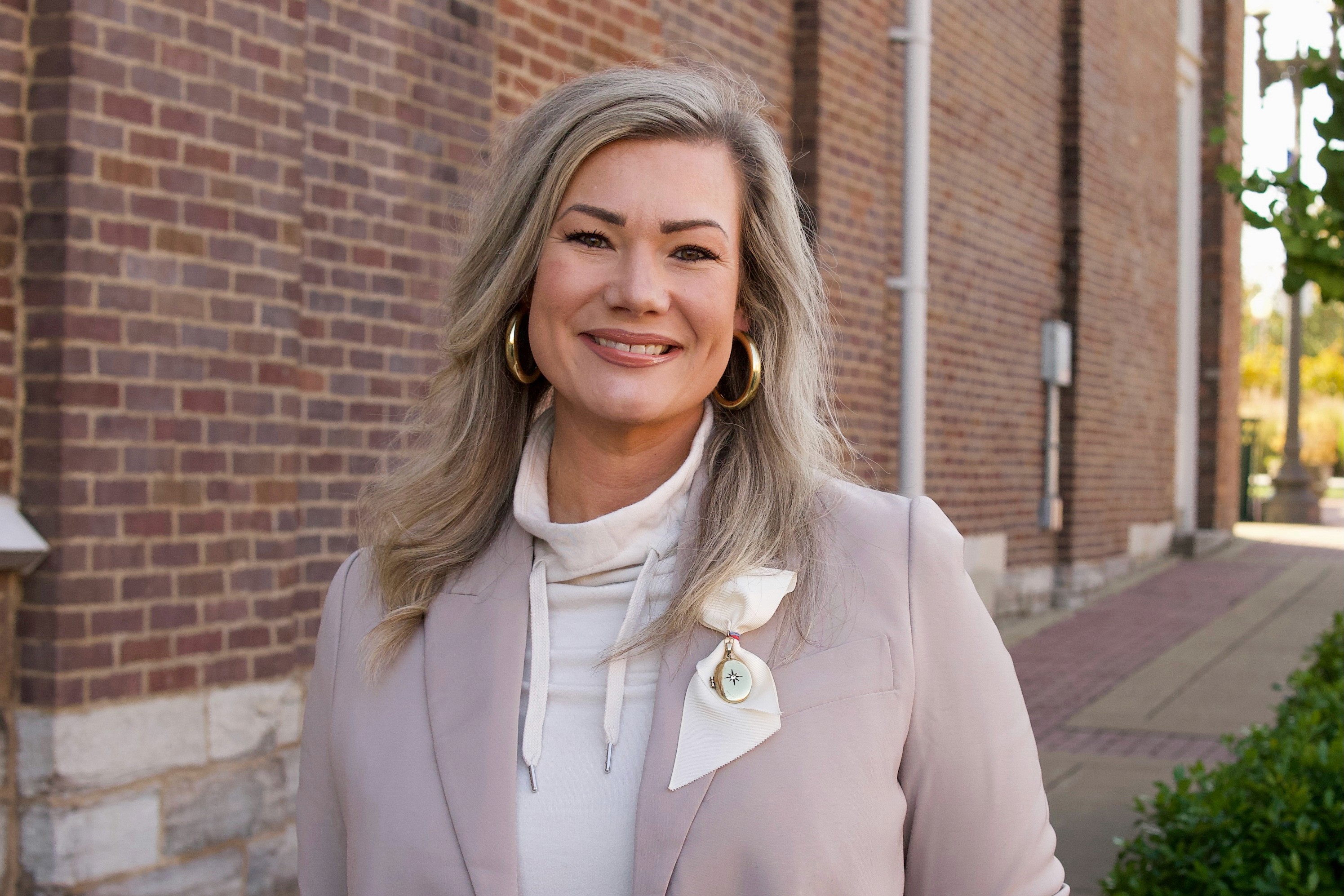 Lauren Pinkston, standing near the courthouse in Columbia, TN