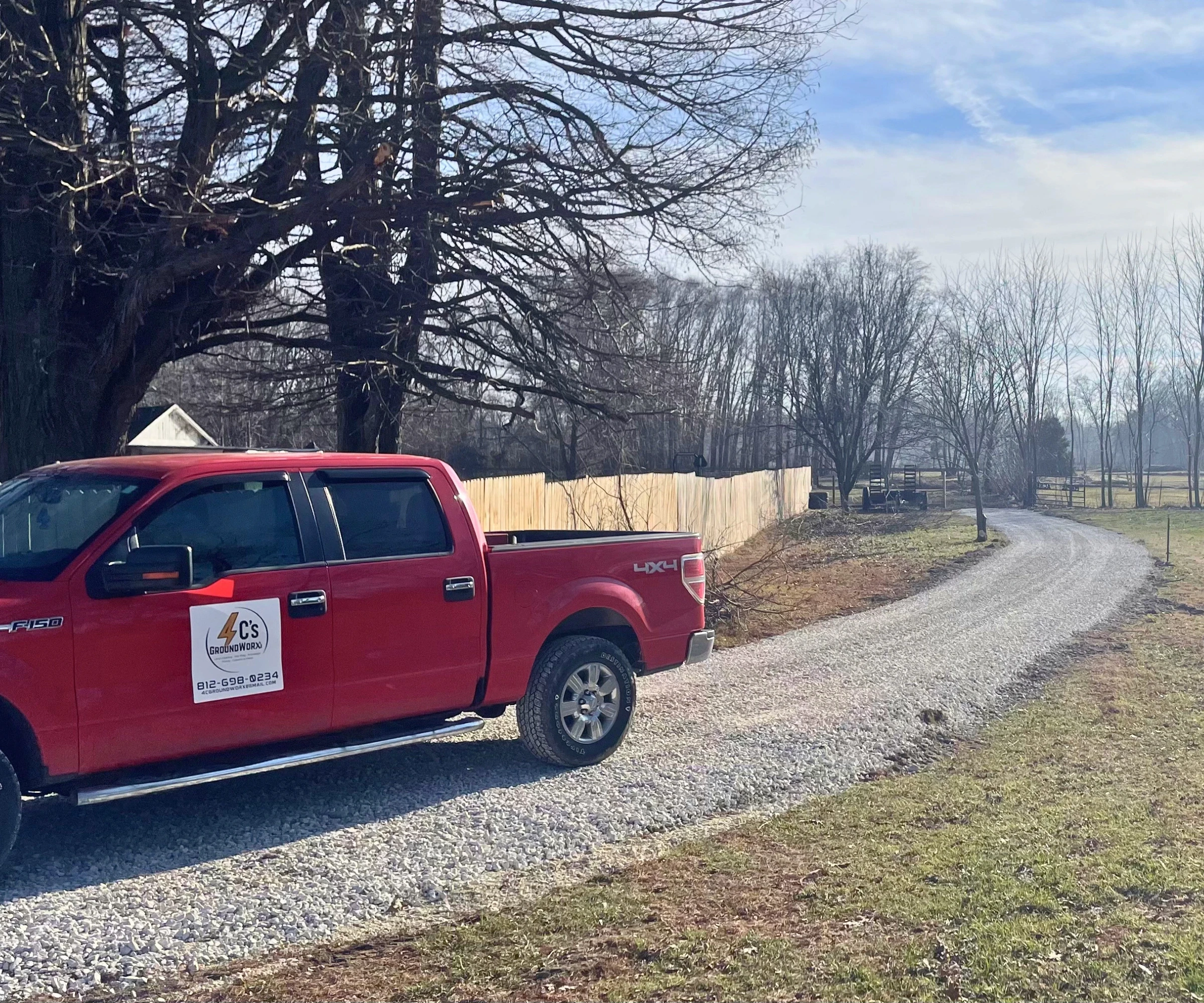 orange and white excavator on brown ground during daytime