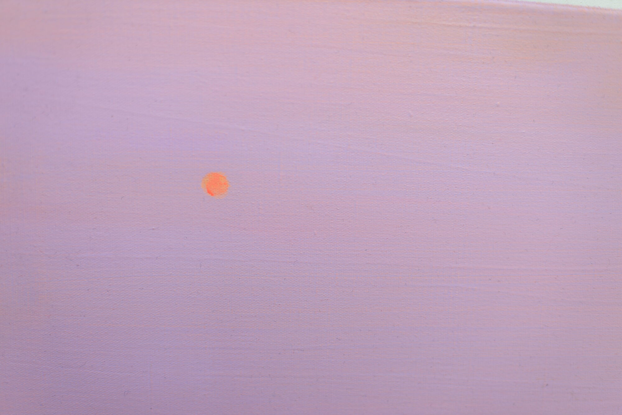 A small, bright orange dot stands out against a soft, smooth lavender background, creating a minimalist and modern artwork.
