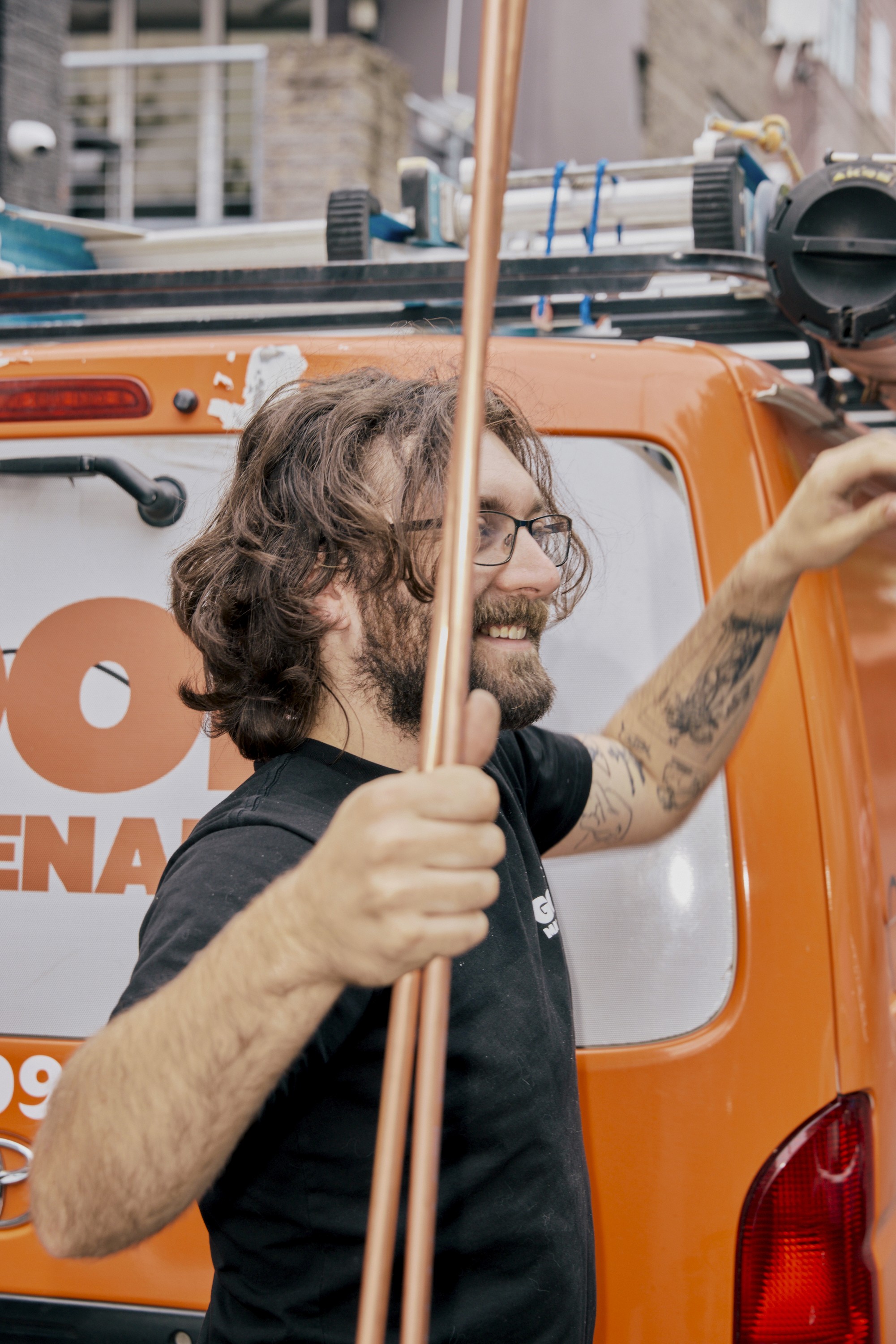 Team Member weaing a Late Night Servicing shirt