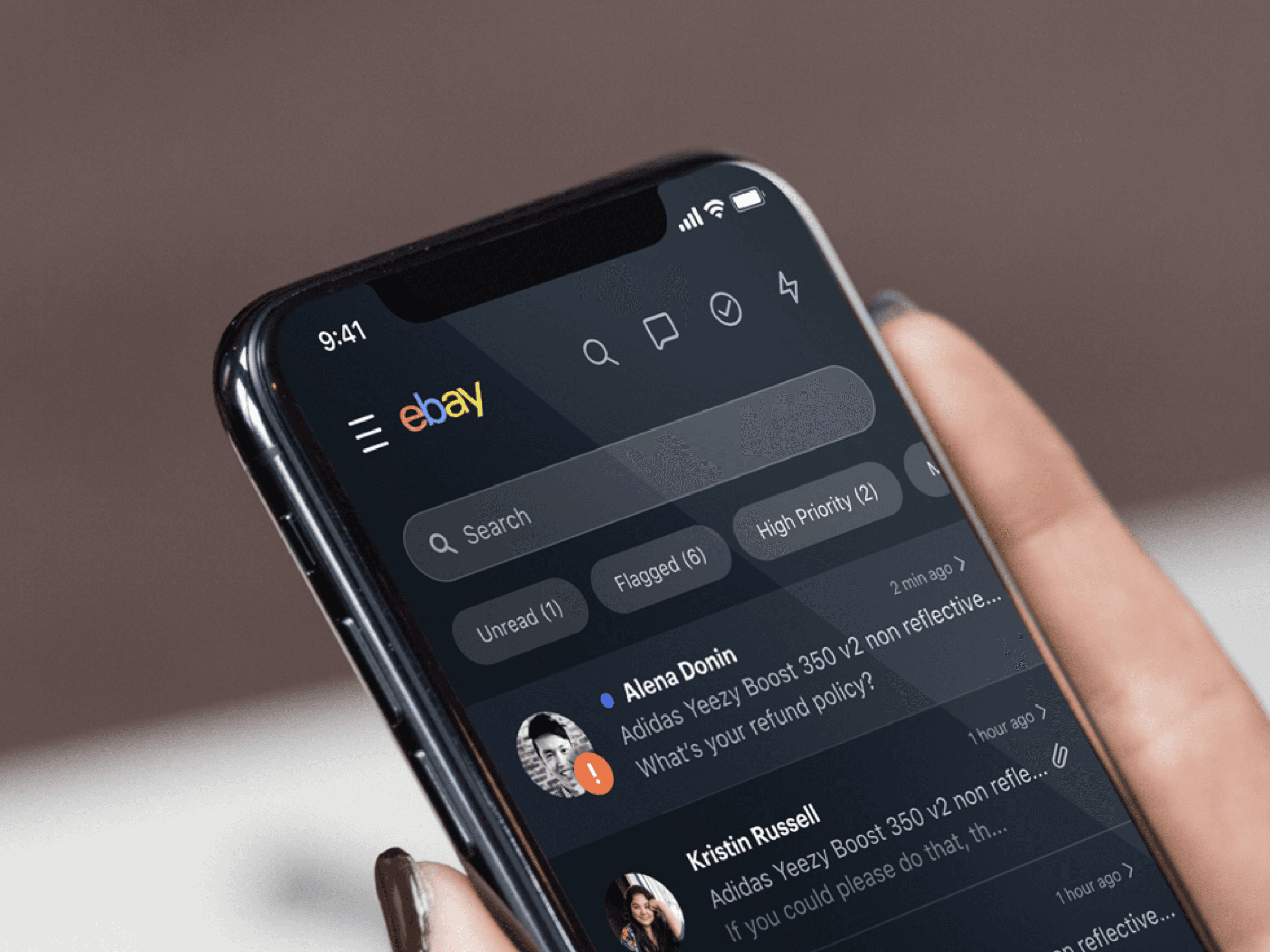 A close up of a mobile phone showing an eBay seller exerience.