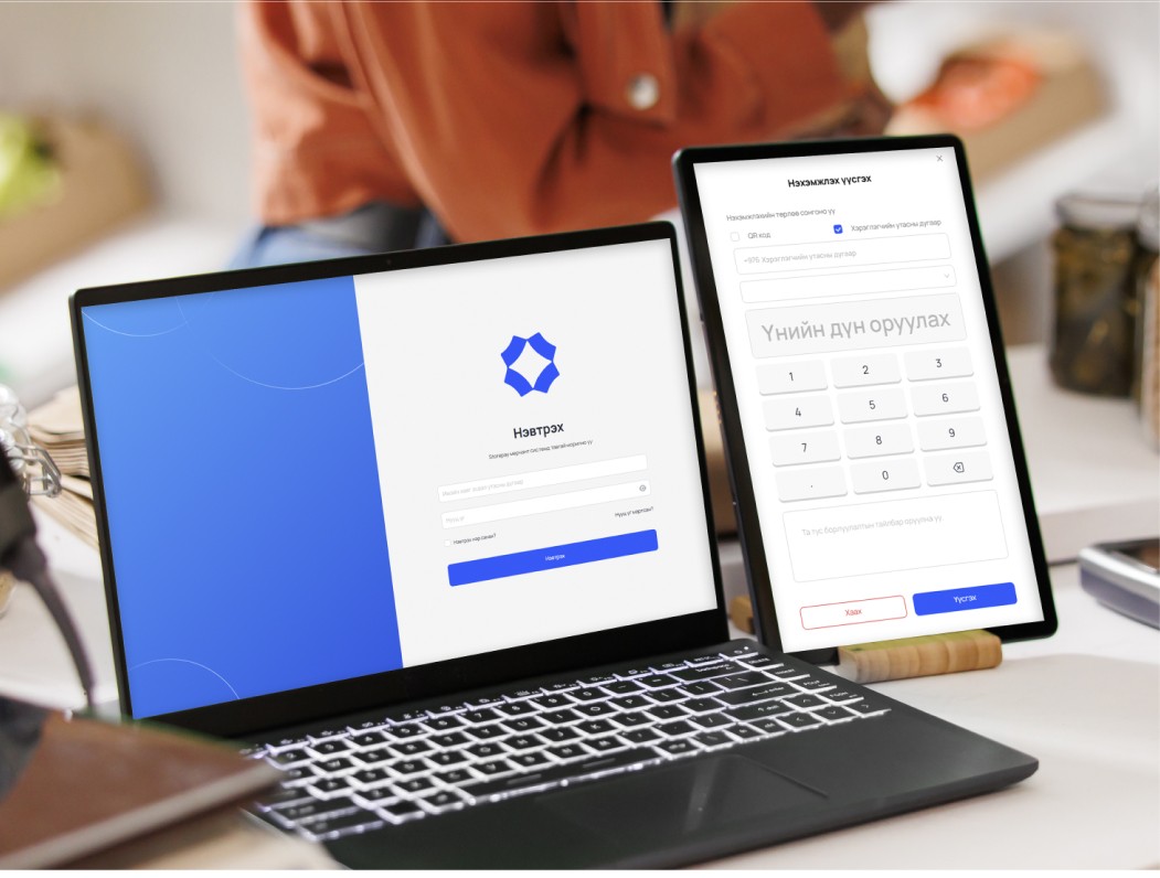 man drawing on dry-erase board