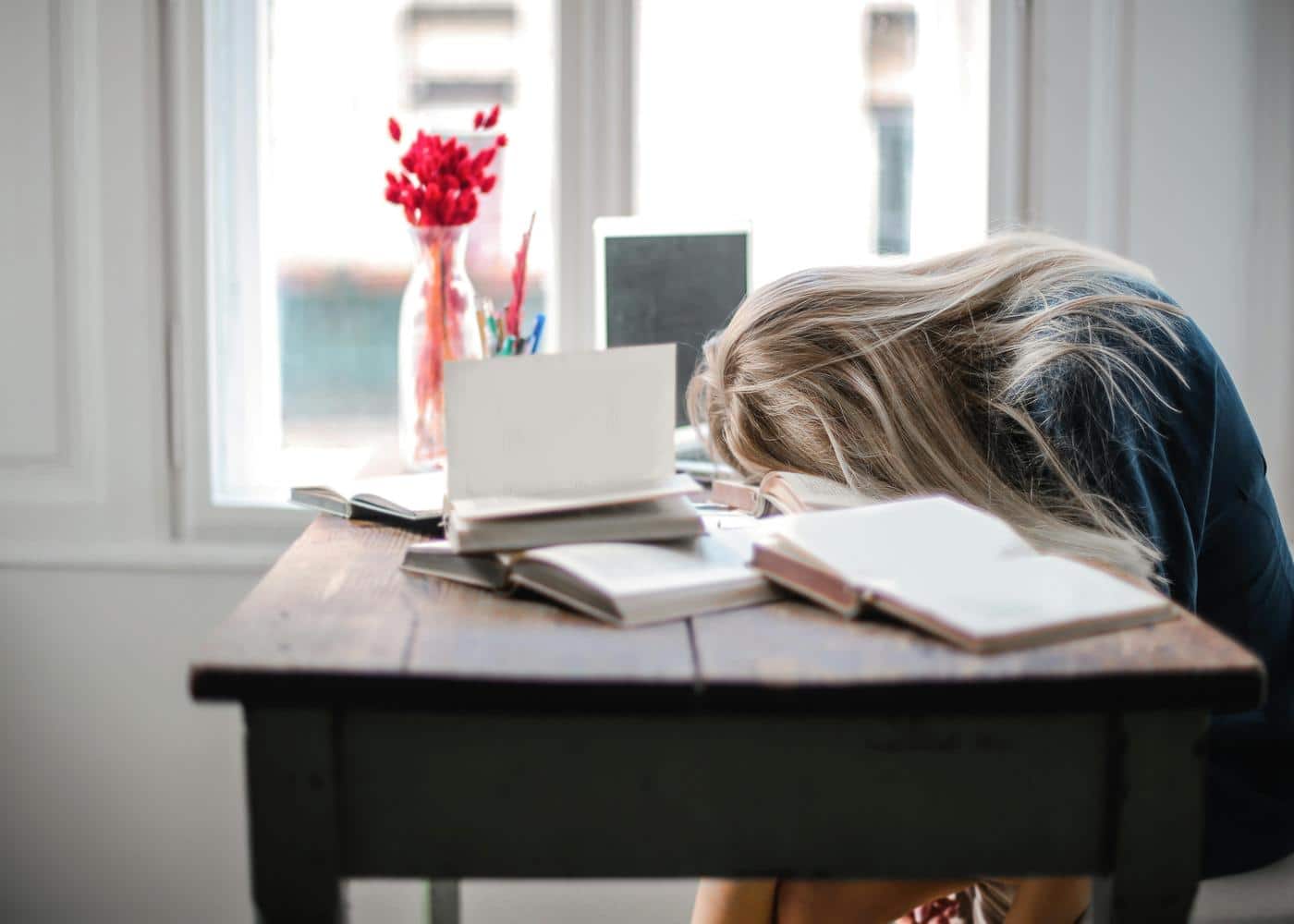 Delayed sleep phase syndrome - woman asleep at her desk