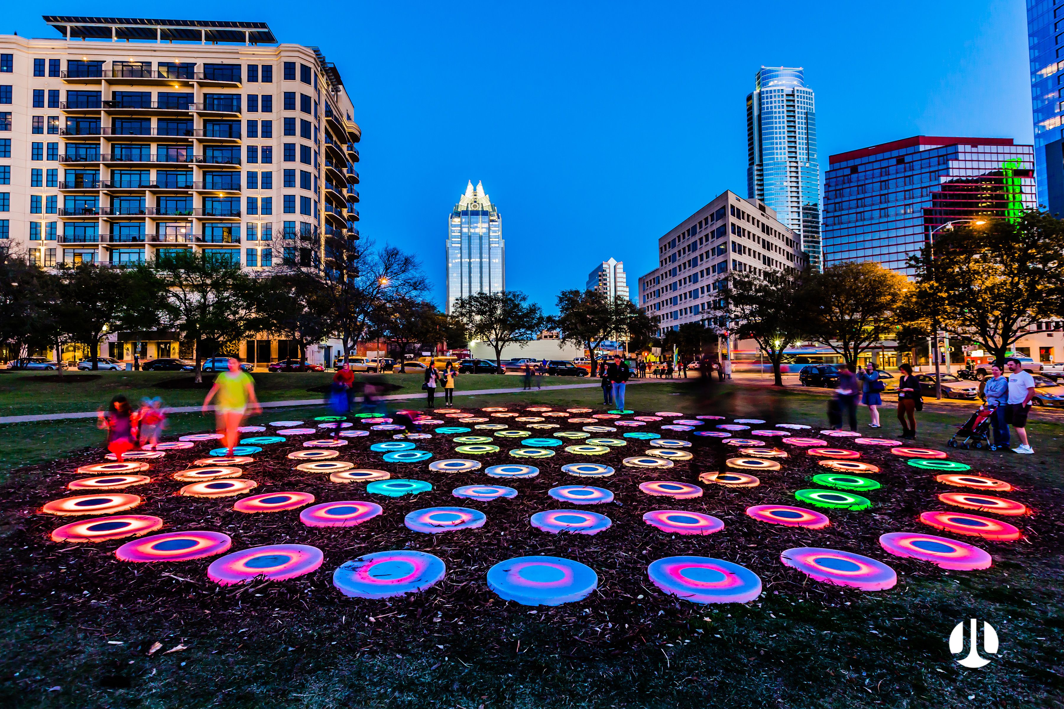 The Pool’s colorful illuminated platforms in use at dusk. Photograph by Aaron Rogosin.