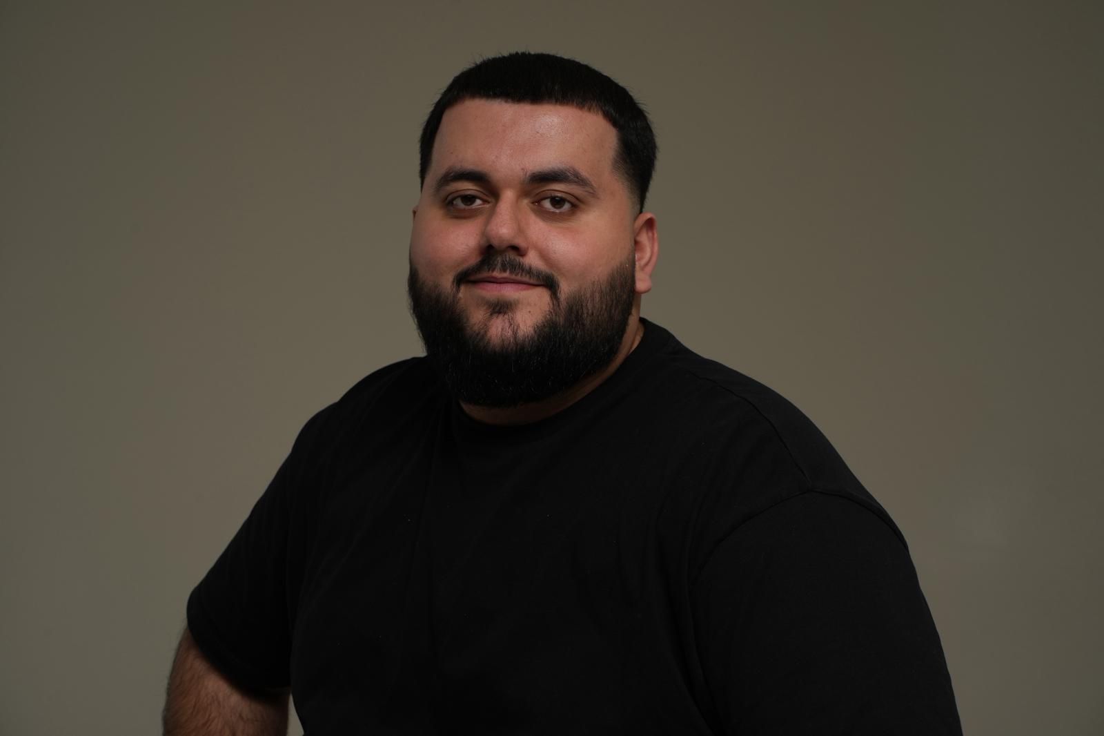 man using smartphone on chair