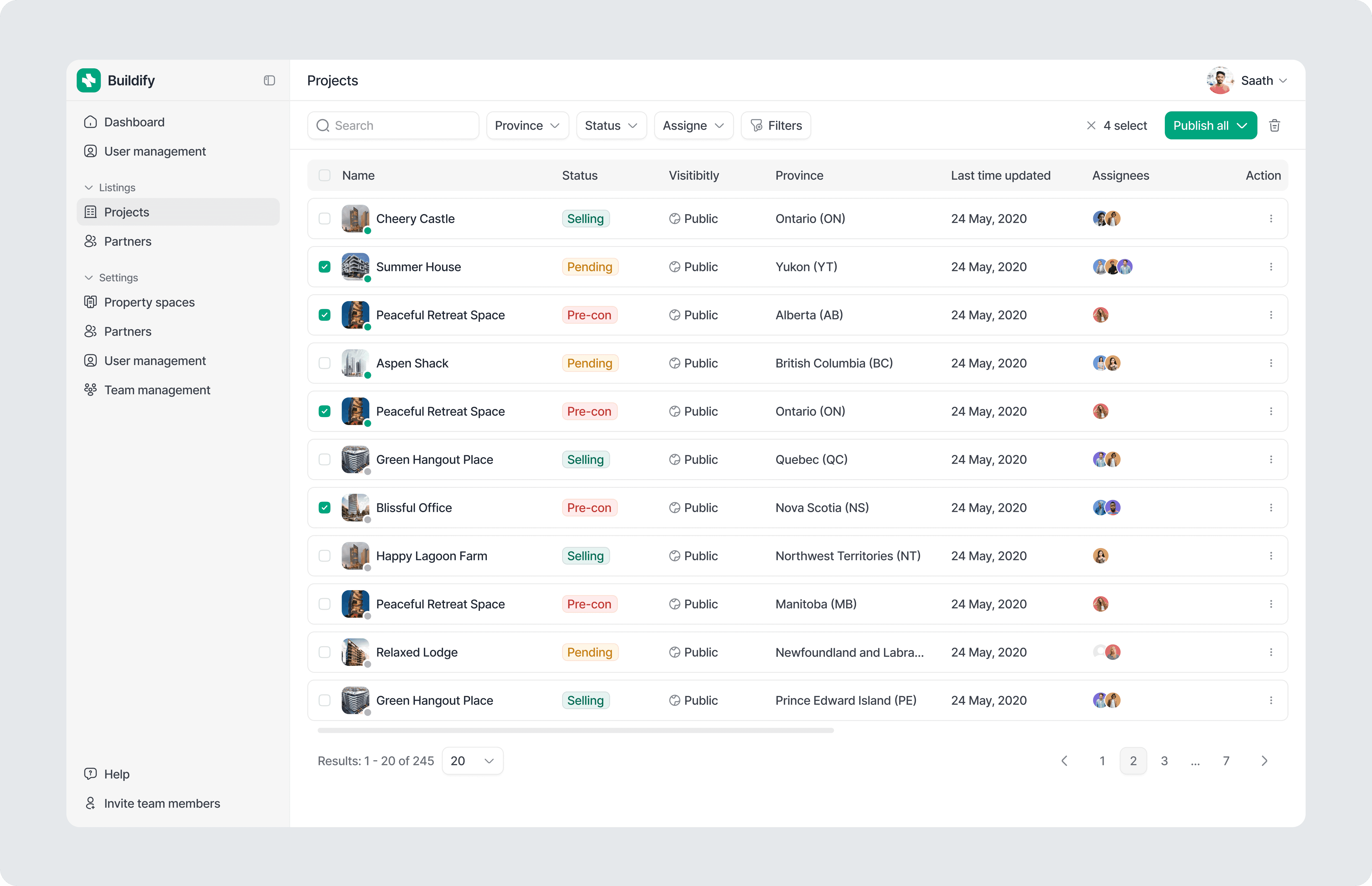Project management table interface for pre-construction listings displaying status, visibility, province, assignees, and bulk publishing actions in an admin dashboard.