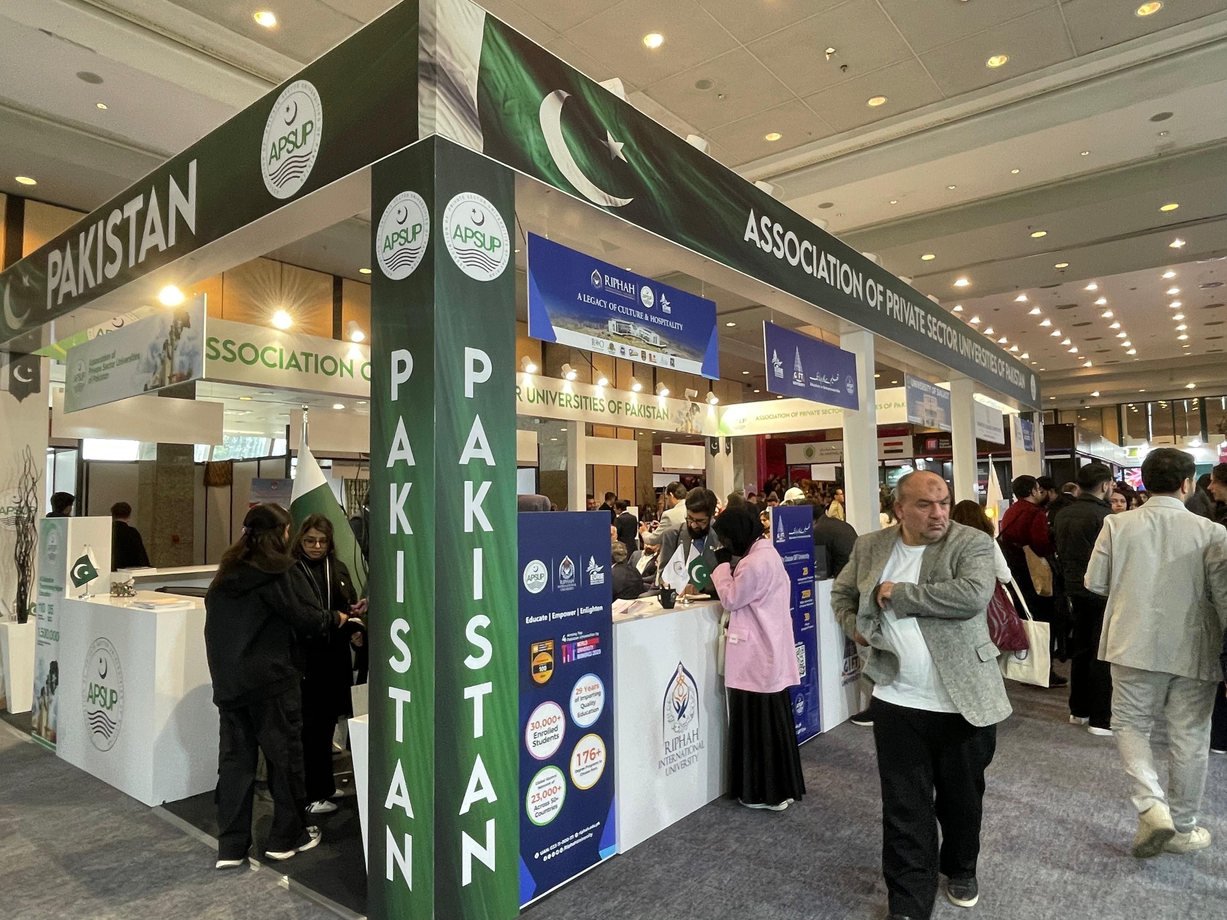 APSUP Gold Sponsor area within the Pakistan Pavilion, featuring prominent branding and a professional presentation space.