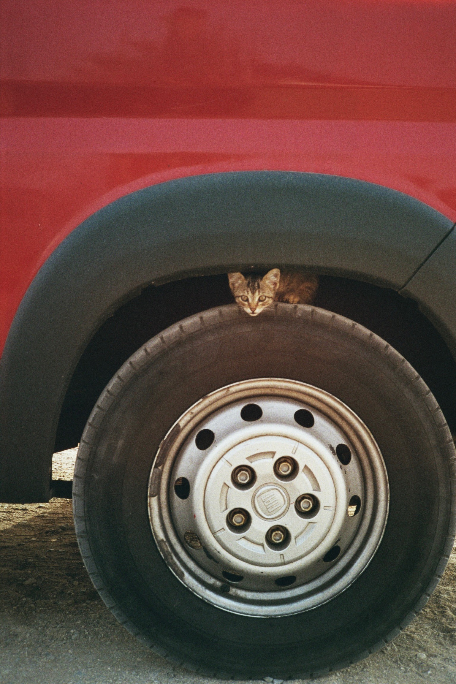 Outdoor Café Seating in a Sunlit Alley