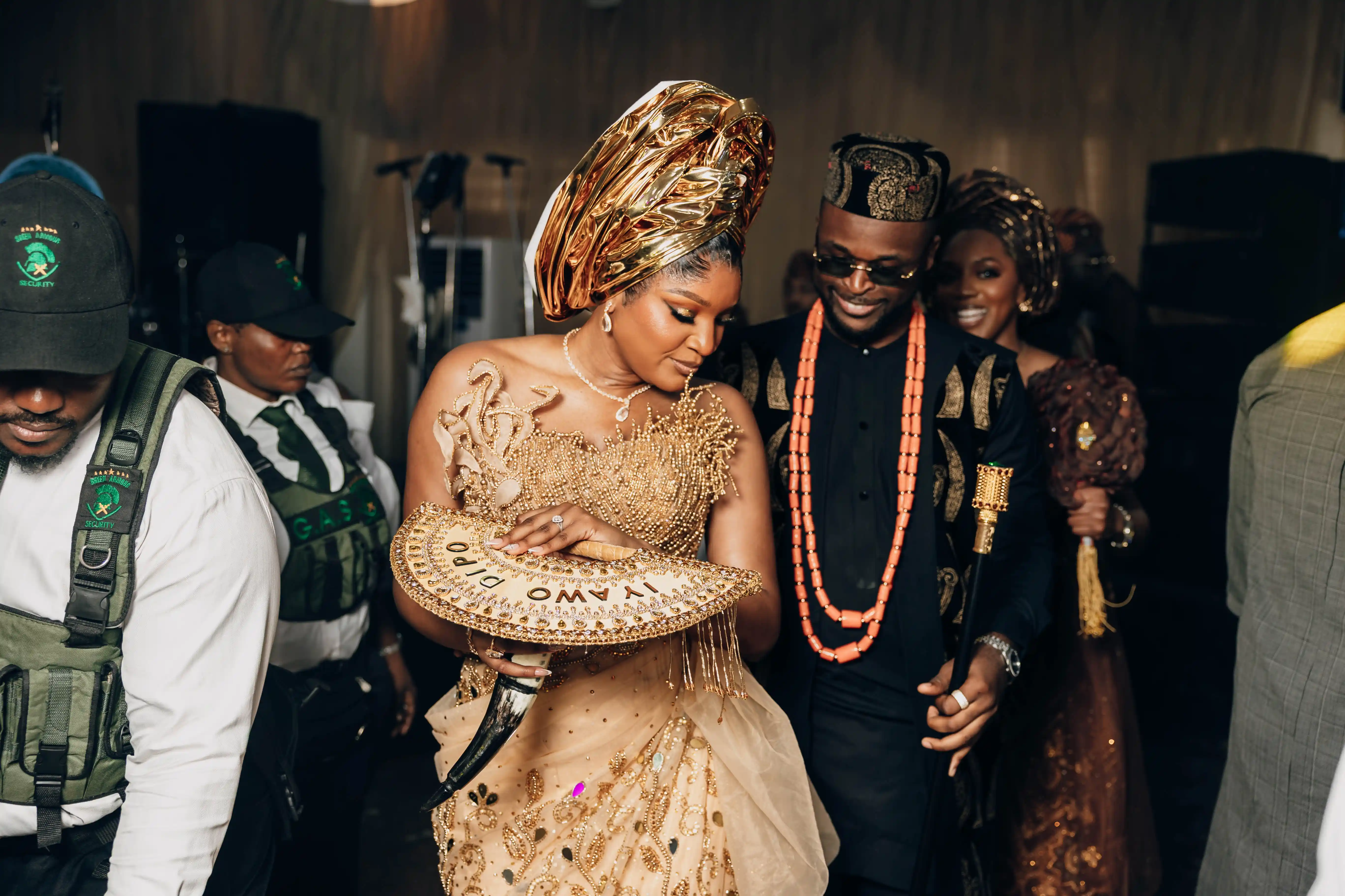 Newlyweds celebrating their wedding ceremony with family and friends.