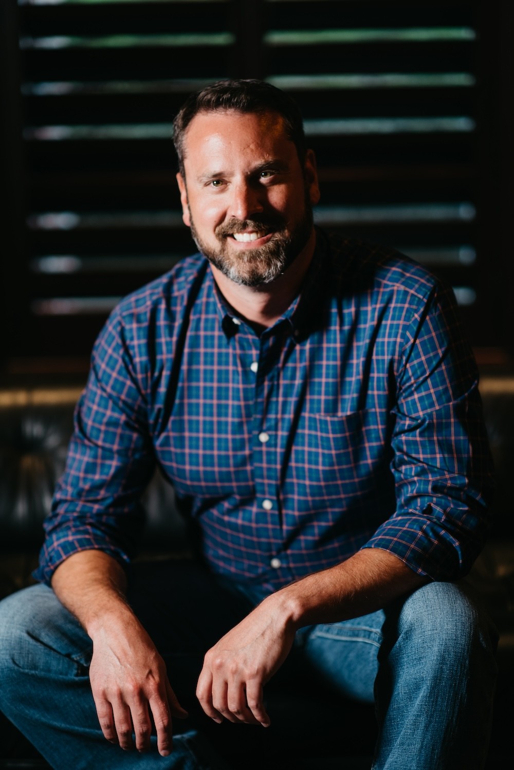 Profile portrait with natural lighting featuring long blonde hair