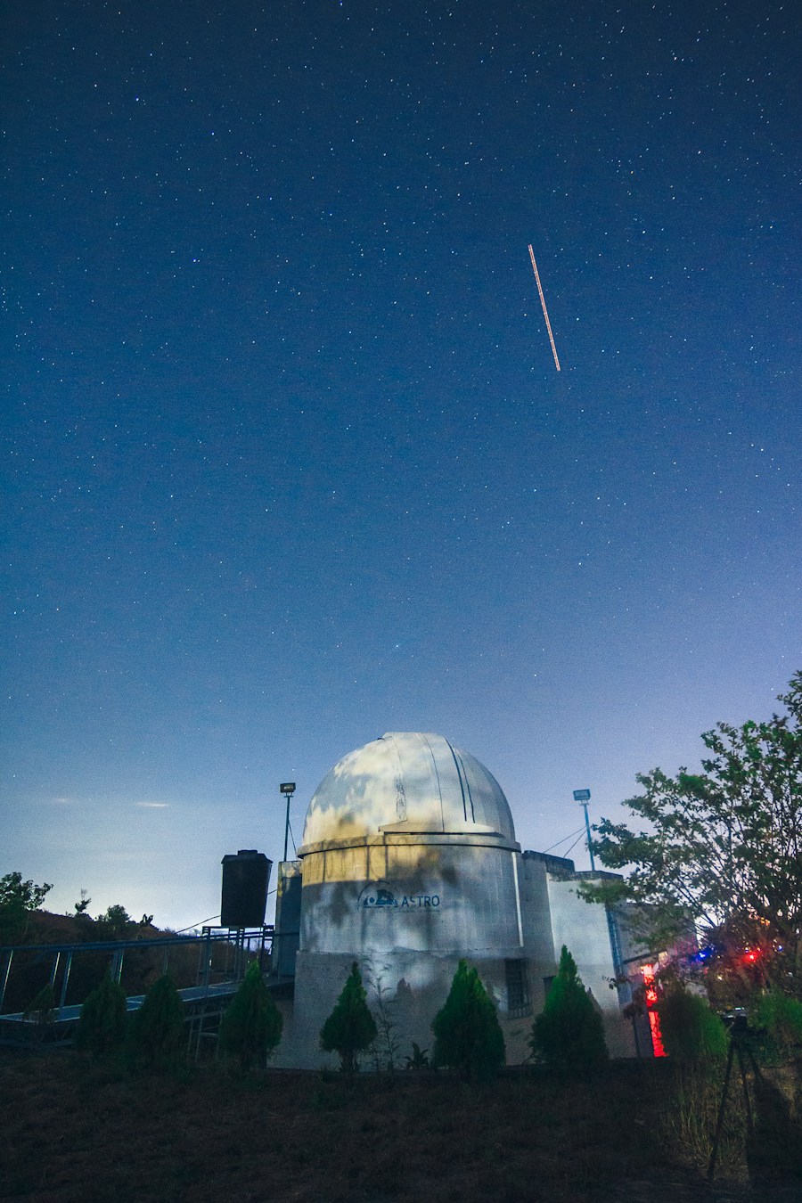Observatory dome under a starry sky
