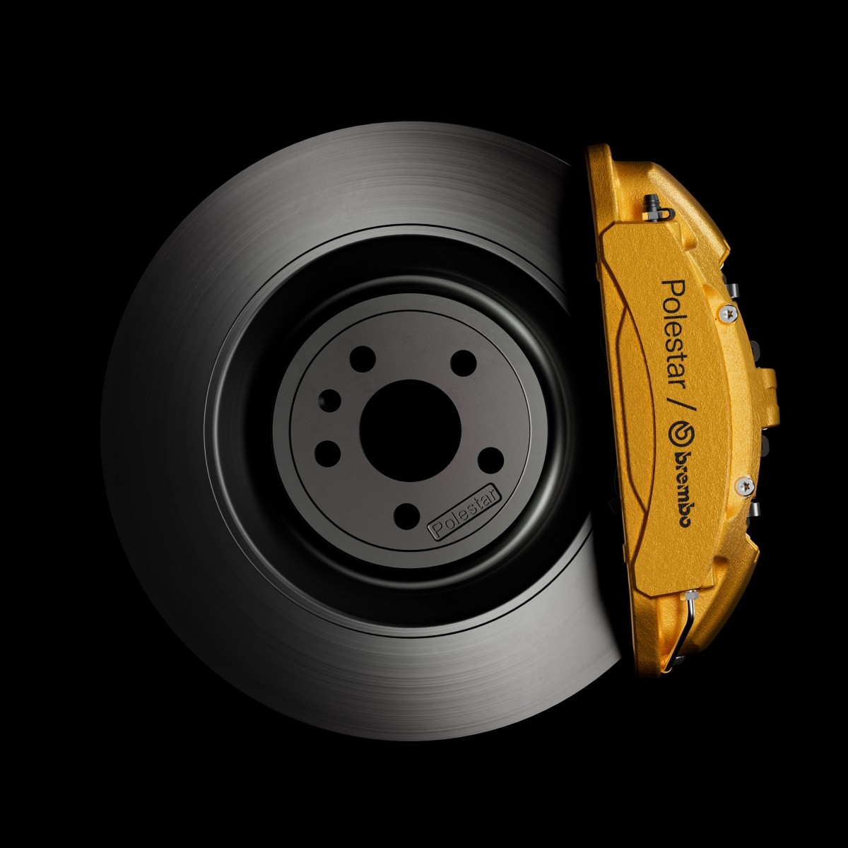 Frein performance Polestar avec étrier Brembo doré et disque ventilé en gros plan
