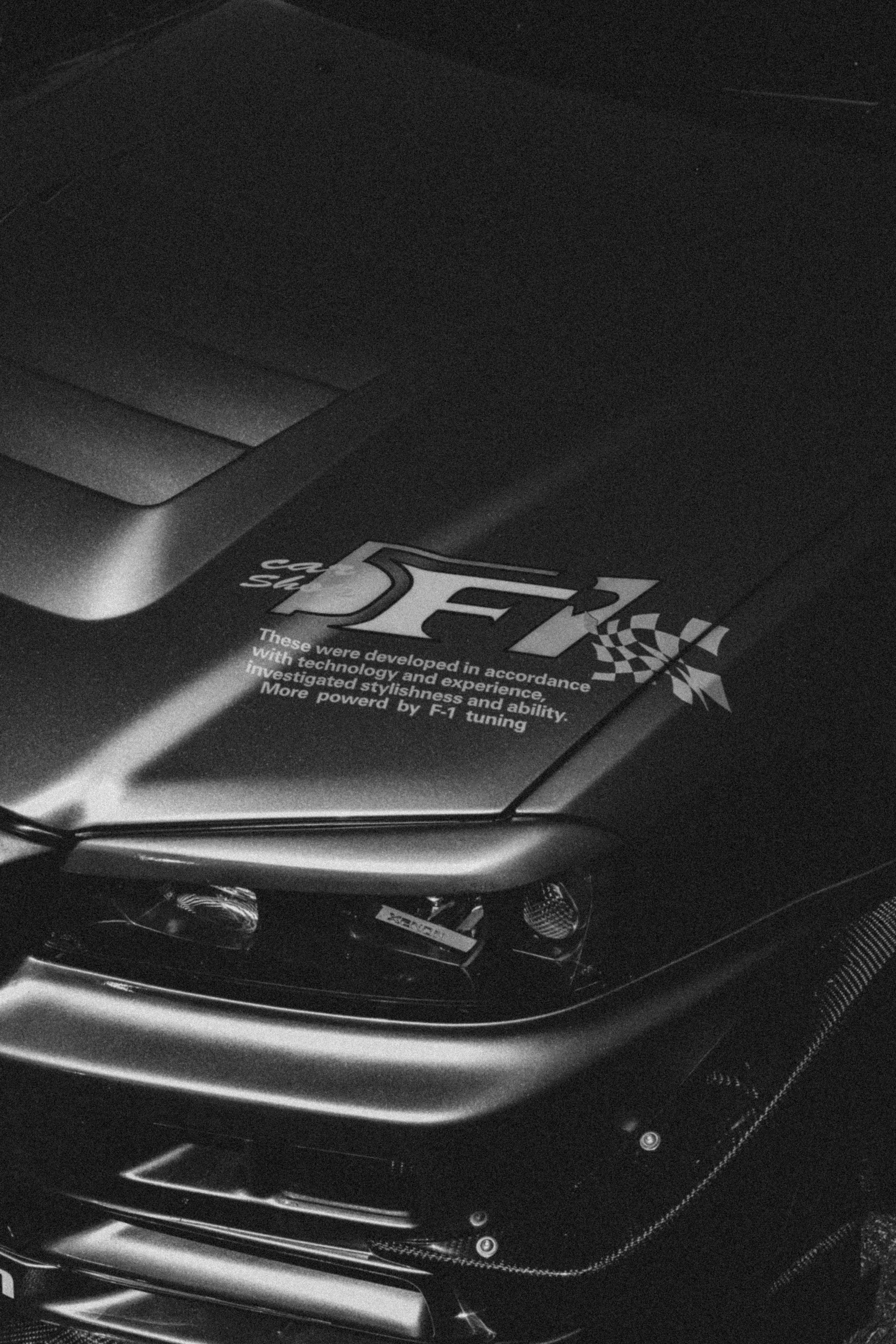 a woman holding a red flower