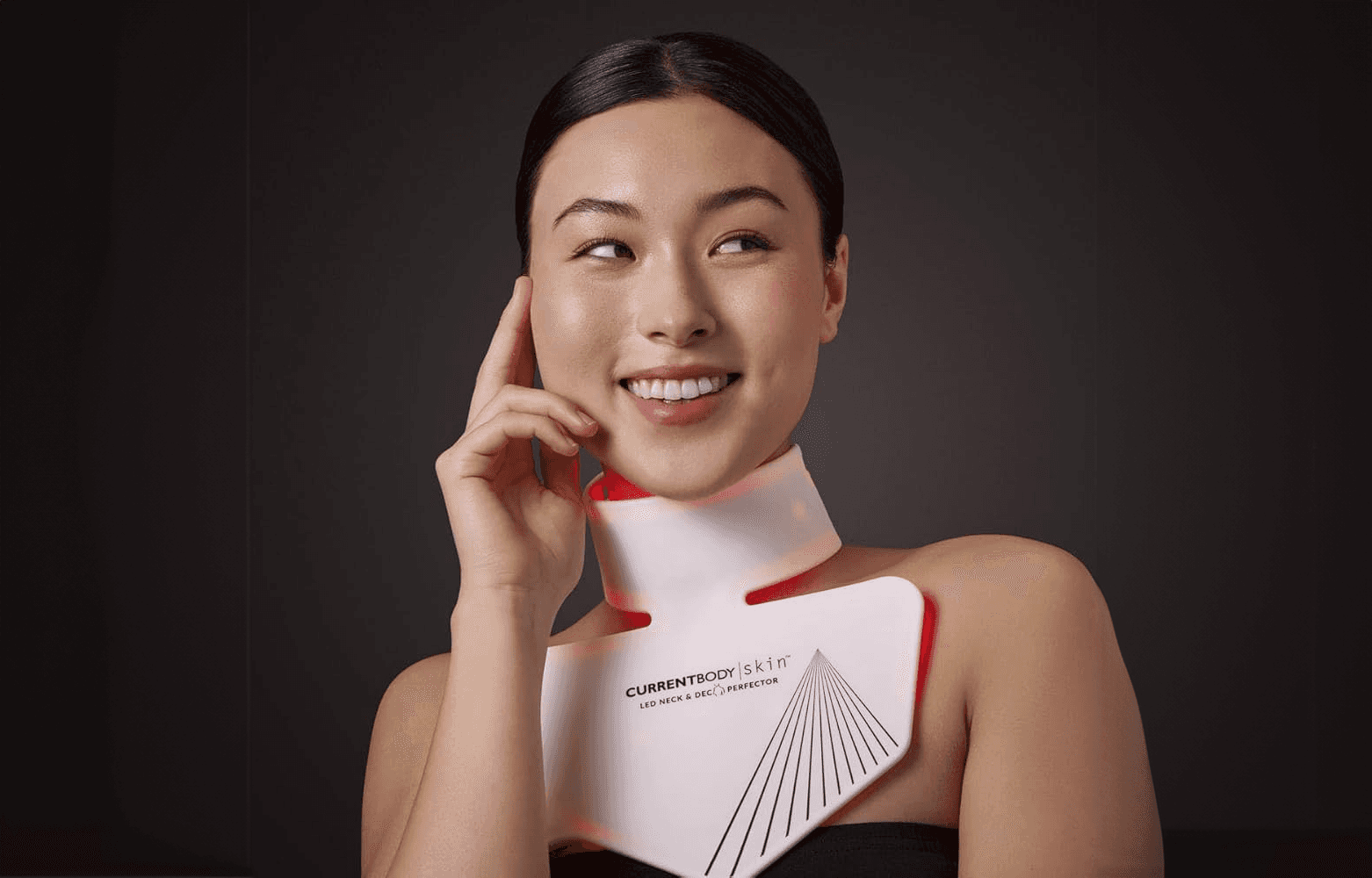 man filming on beach