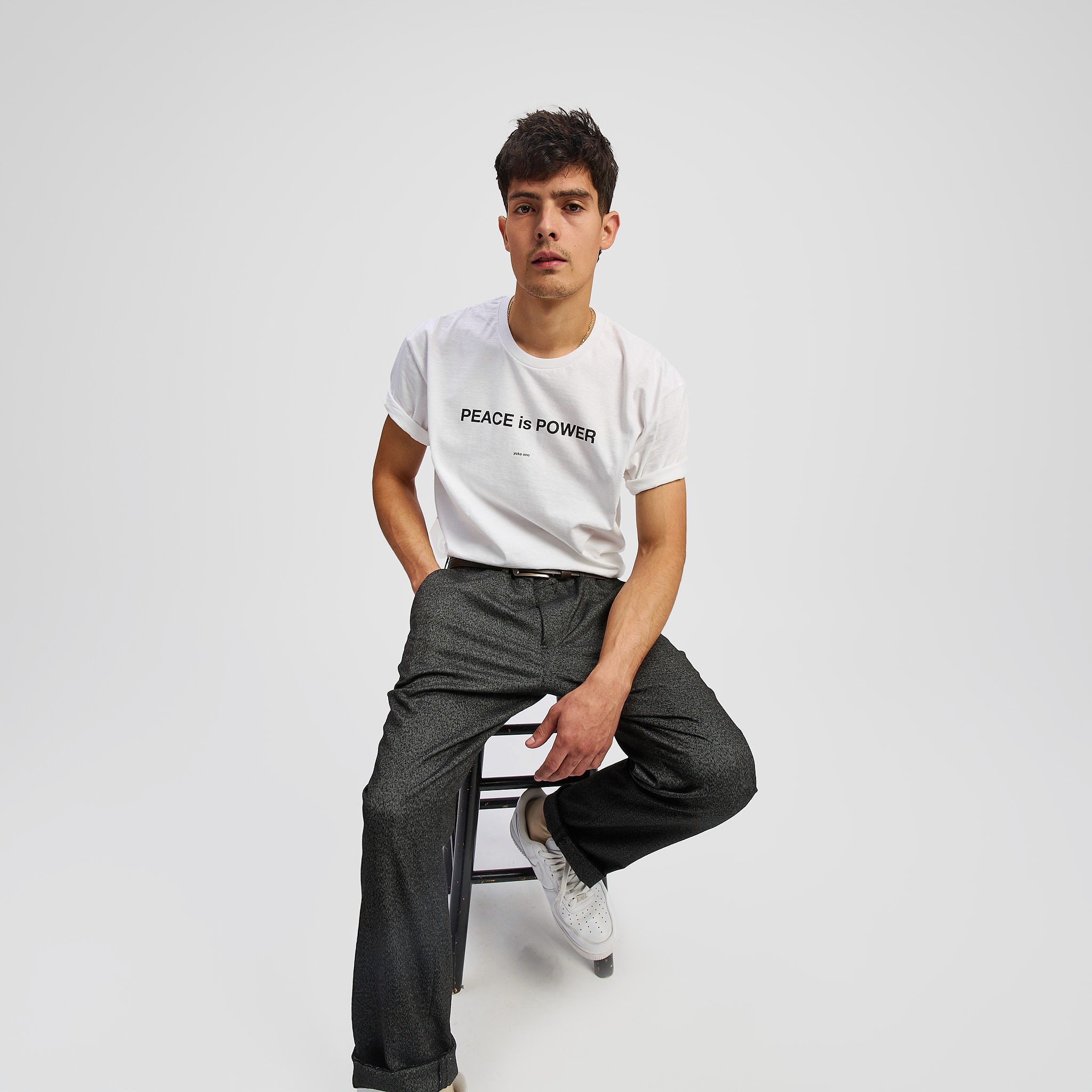 American flag flying against a cloudy sky