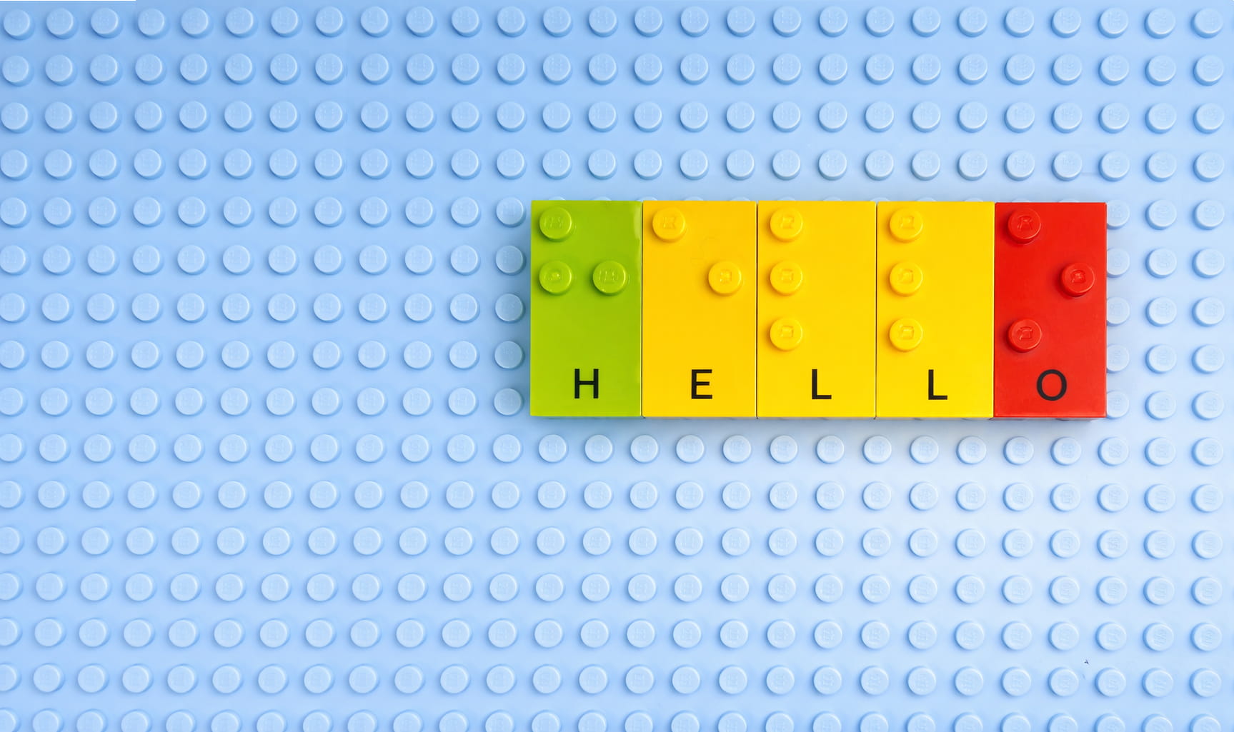 Colourful Braille lego blocks spelling the word hello