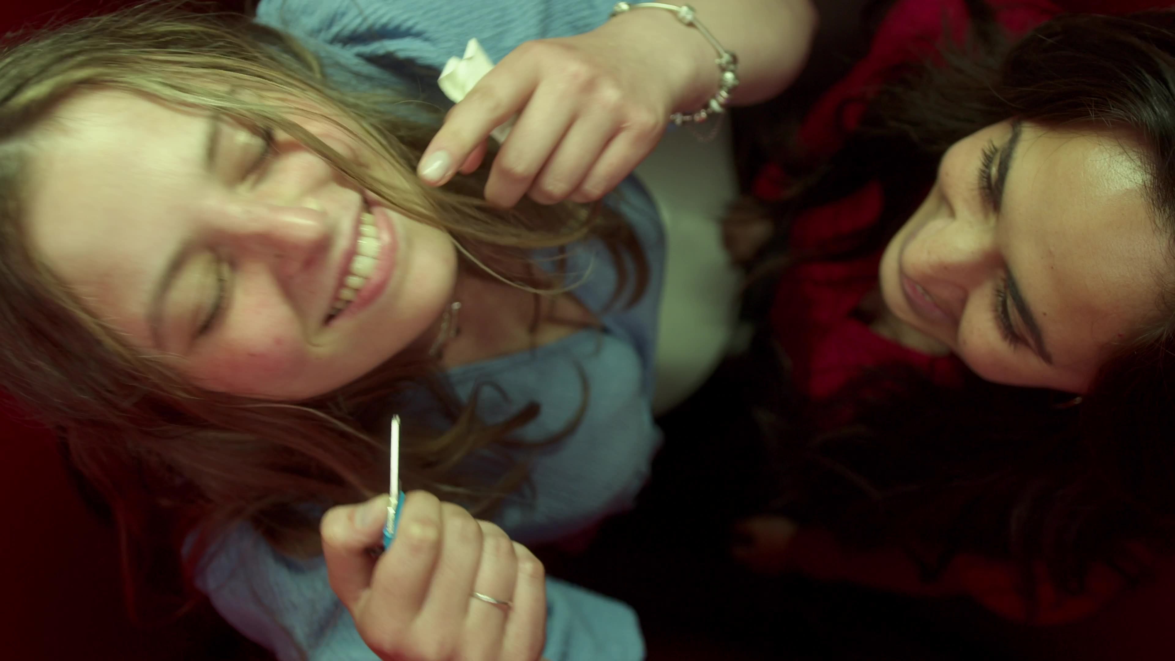 The image captures the ethereal beauty of an underwater cave illuminated by sunbeams penetrating through an opening above.