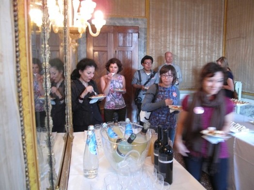 A photo of a group of people at a swedish buffet.