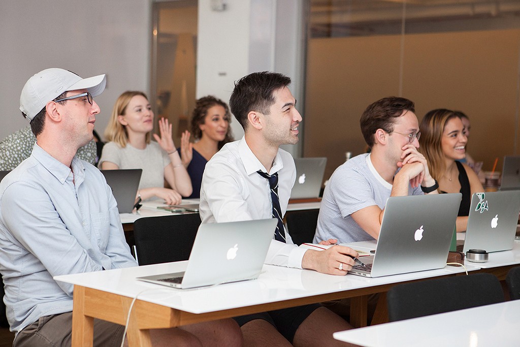 A team mid-discussion in a collaborative session, decisions being shaped in real time.