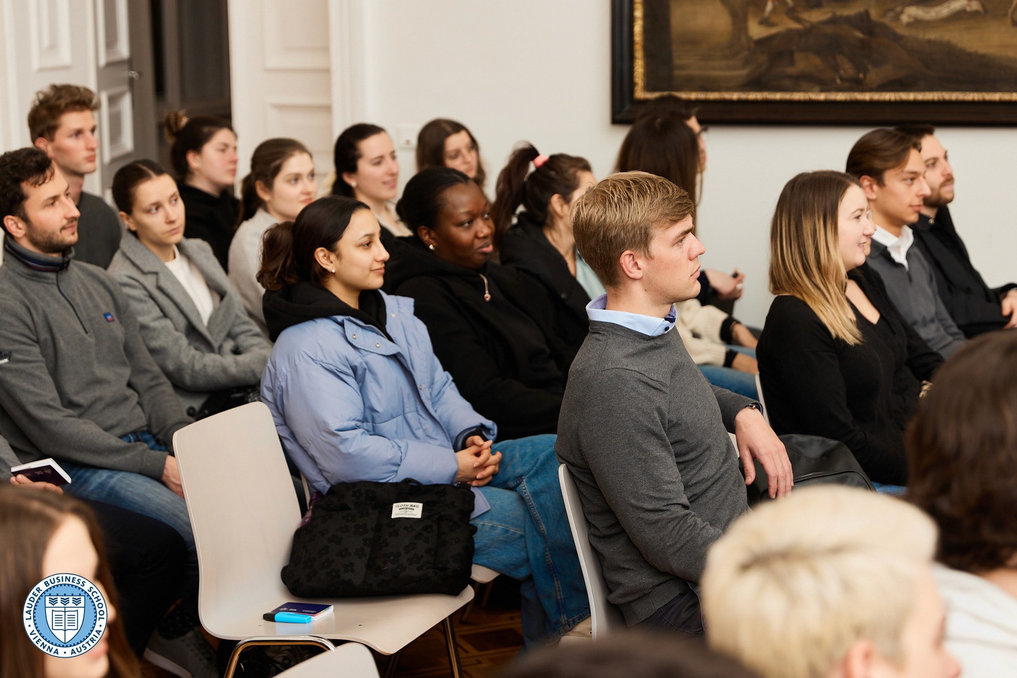 LBS students listening to  Adam Lessing, Ph.D., Head of Relationship Management at LGT Bank Österreich