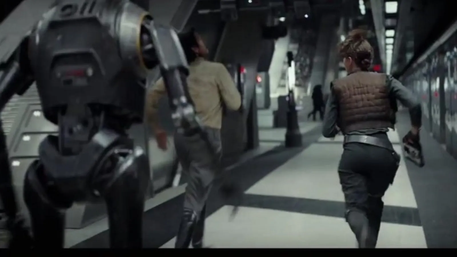 In a futuristic corridor, three figures, including a large humanoid robot and two individuals in tactical gear, are running towards a brightly lit exit, conveying a sense of urgency and action.