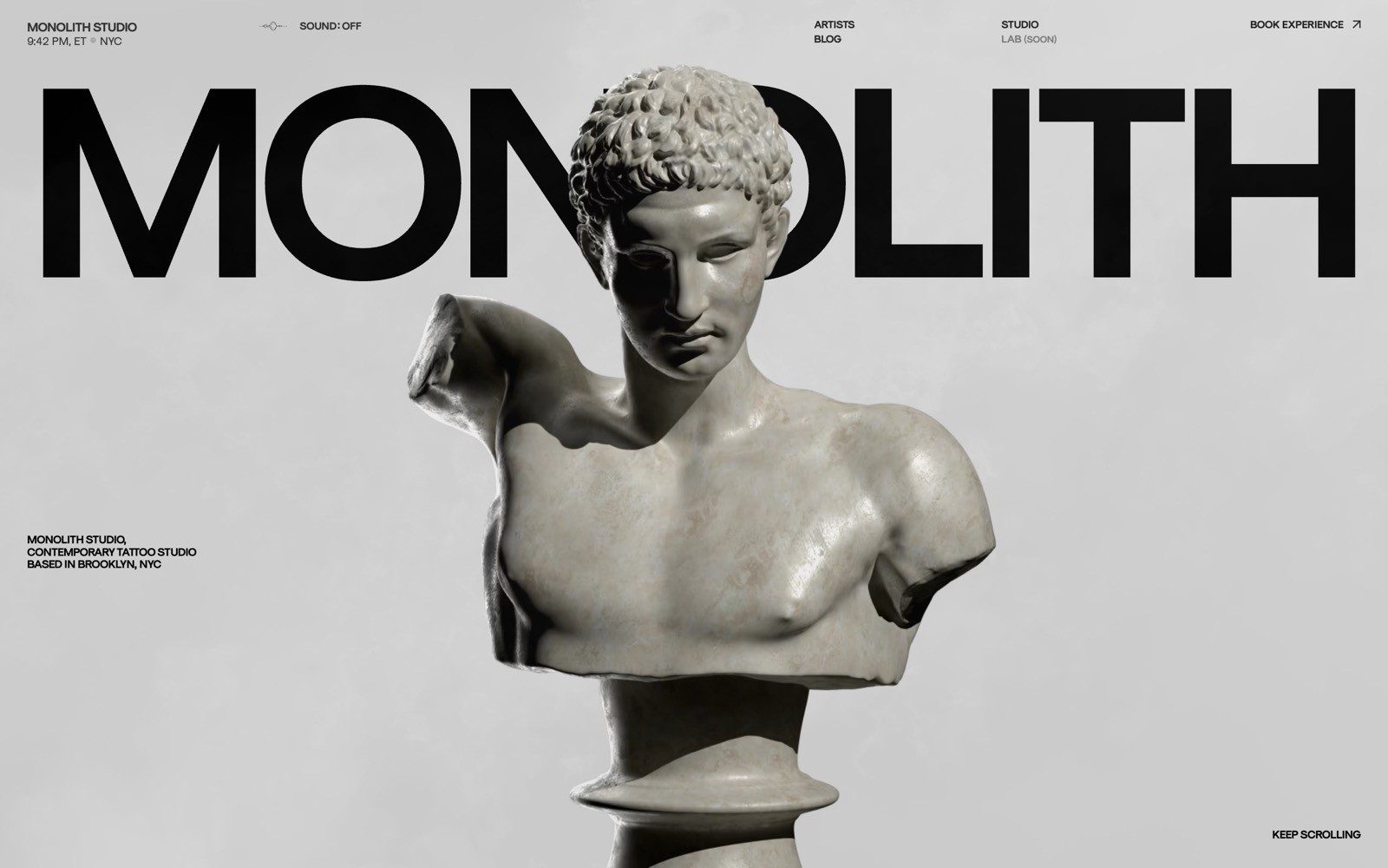 Marble bust of a classical statue on a gray background with the word "MONOLITH" in bold black letters above.
