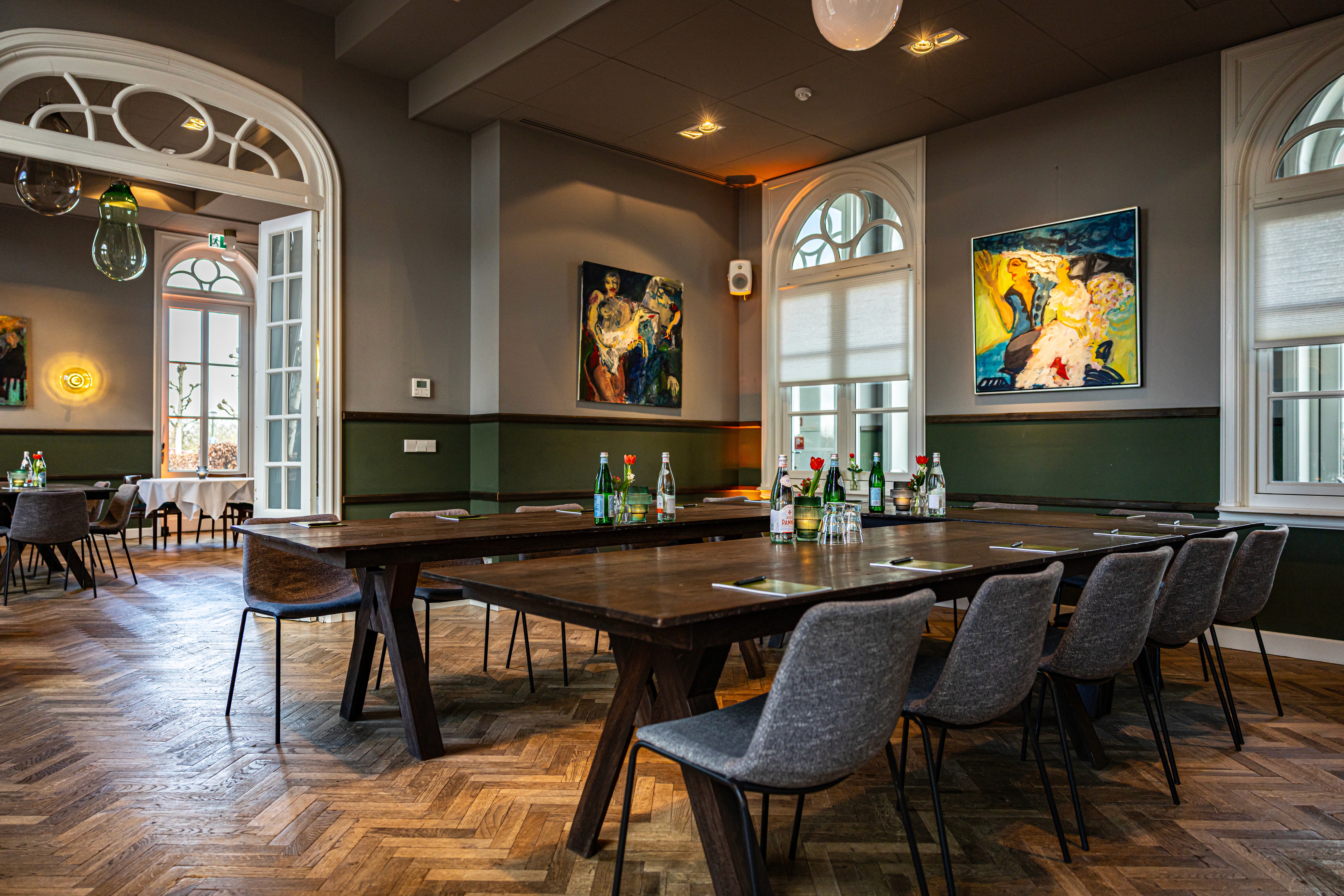 art deco styled bedroom with accsent mirror above the bed