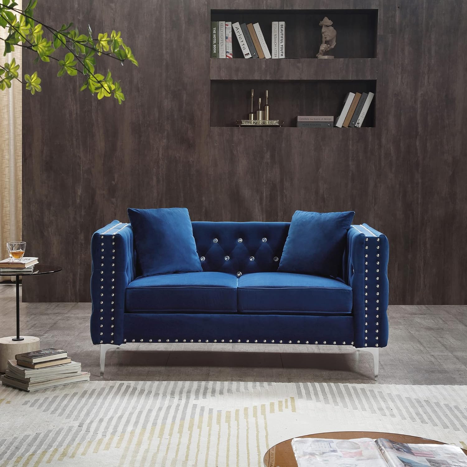 Stylish blue sofa set with a coordinated look, ideal for creating a cozy and inviting seating area in contemporary spaces.