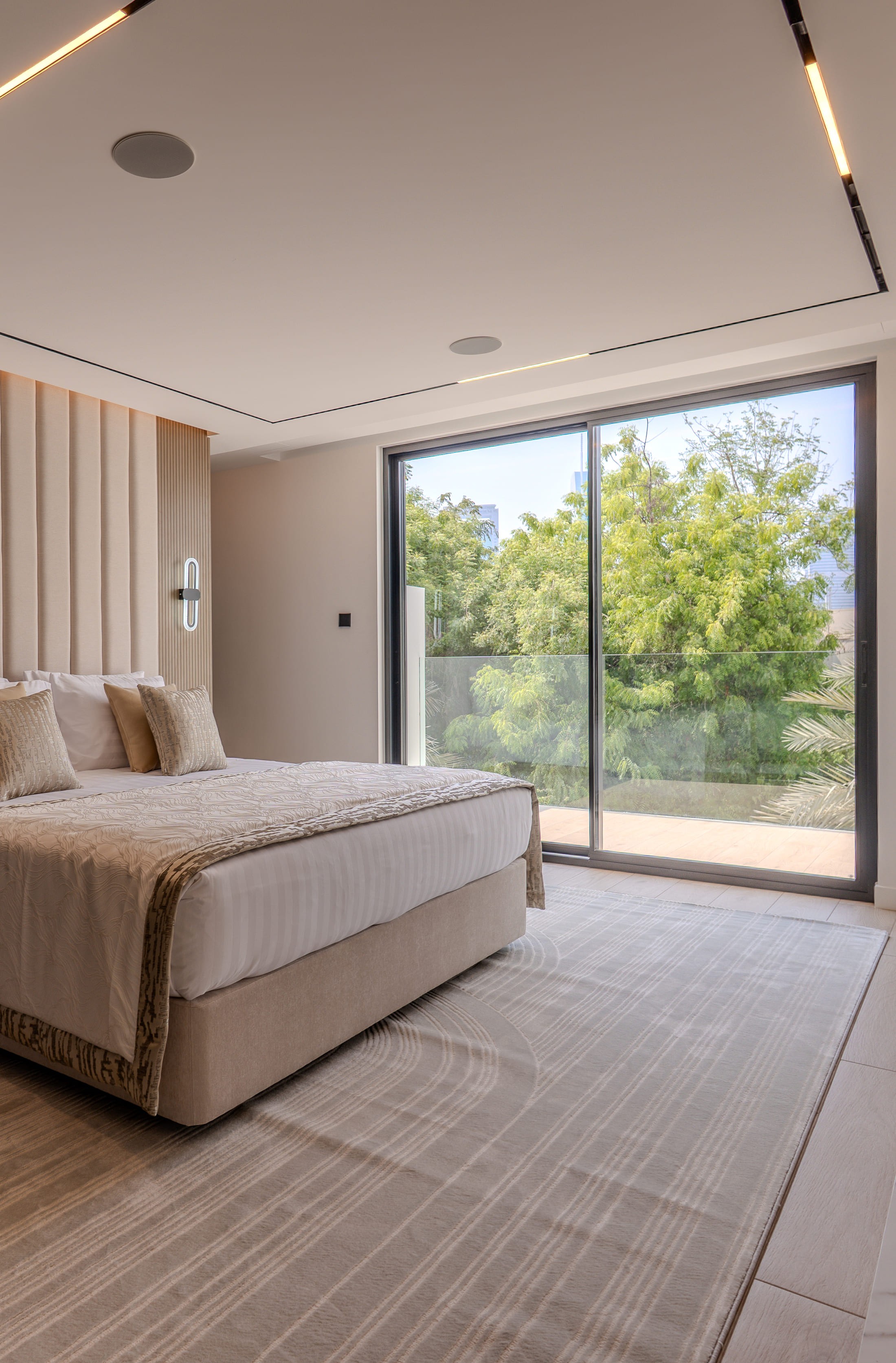 Image of a large villa with big glass windows