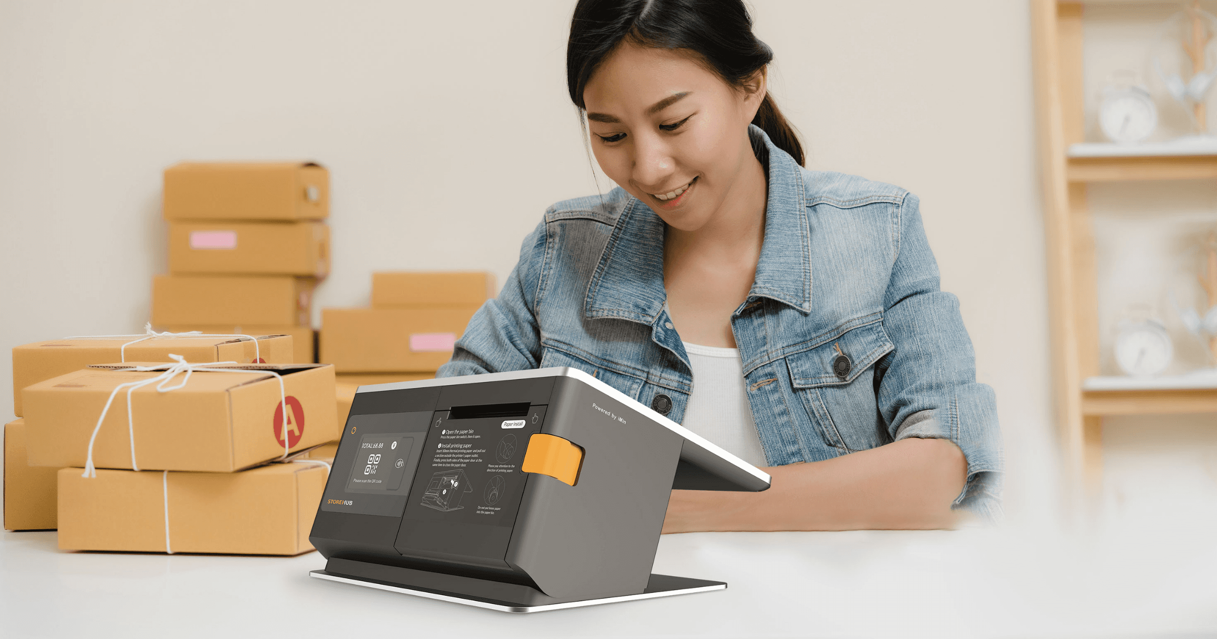 Small business owner in Malaysia using the StoreHub POS for e-invoicing